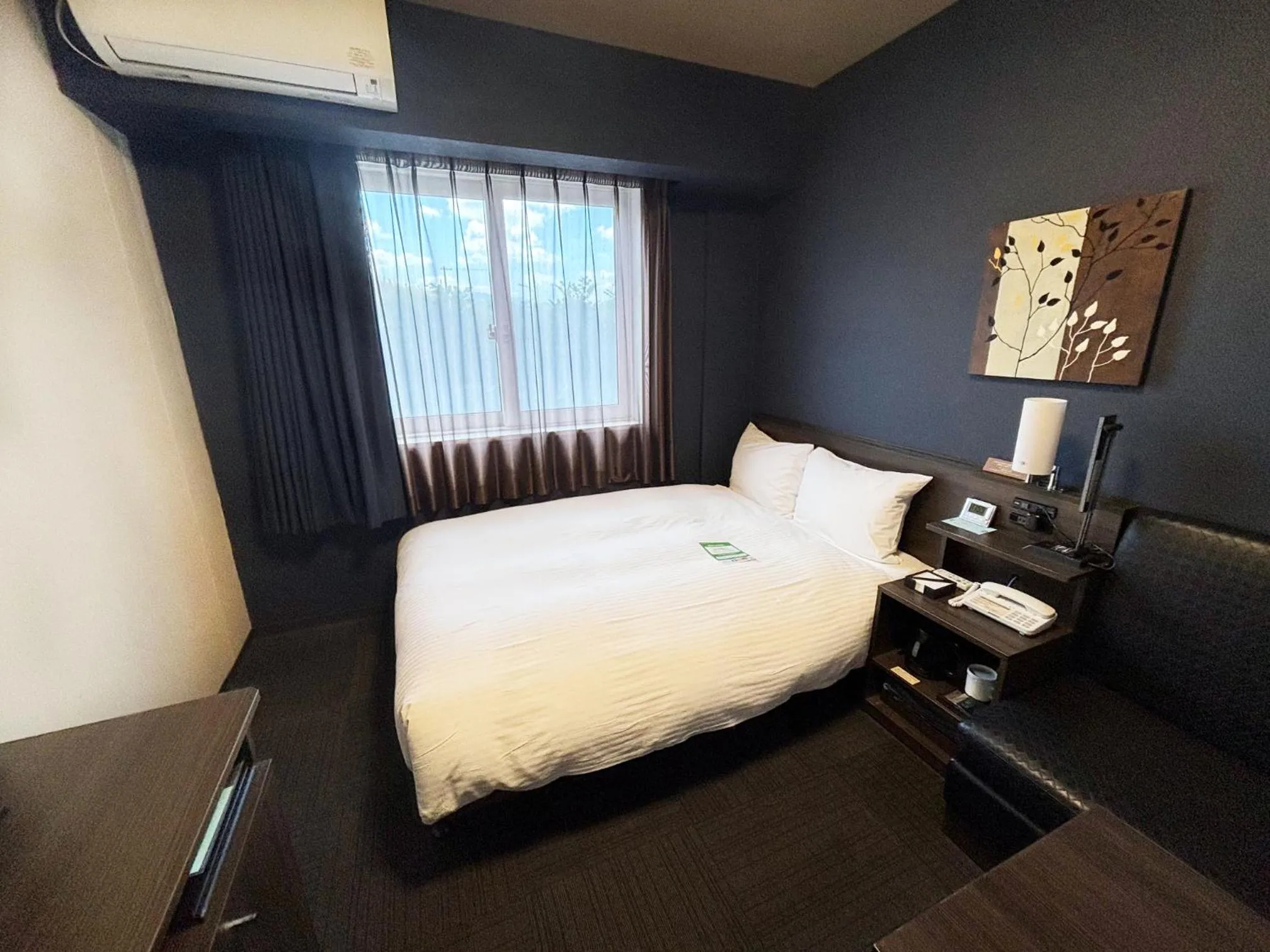 Photo of the whole room, Bed in Hotel Route Inn Osaka Izumi -Kishiwada Izumi Inter-
