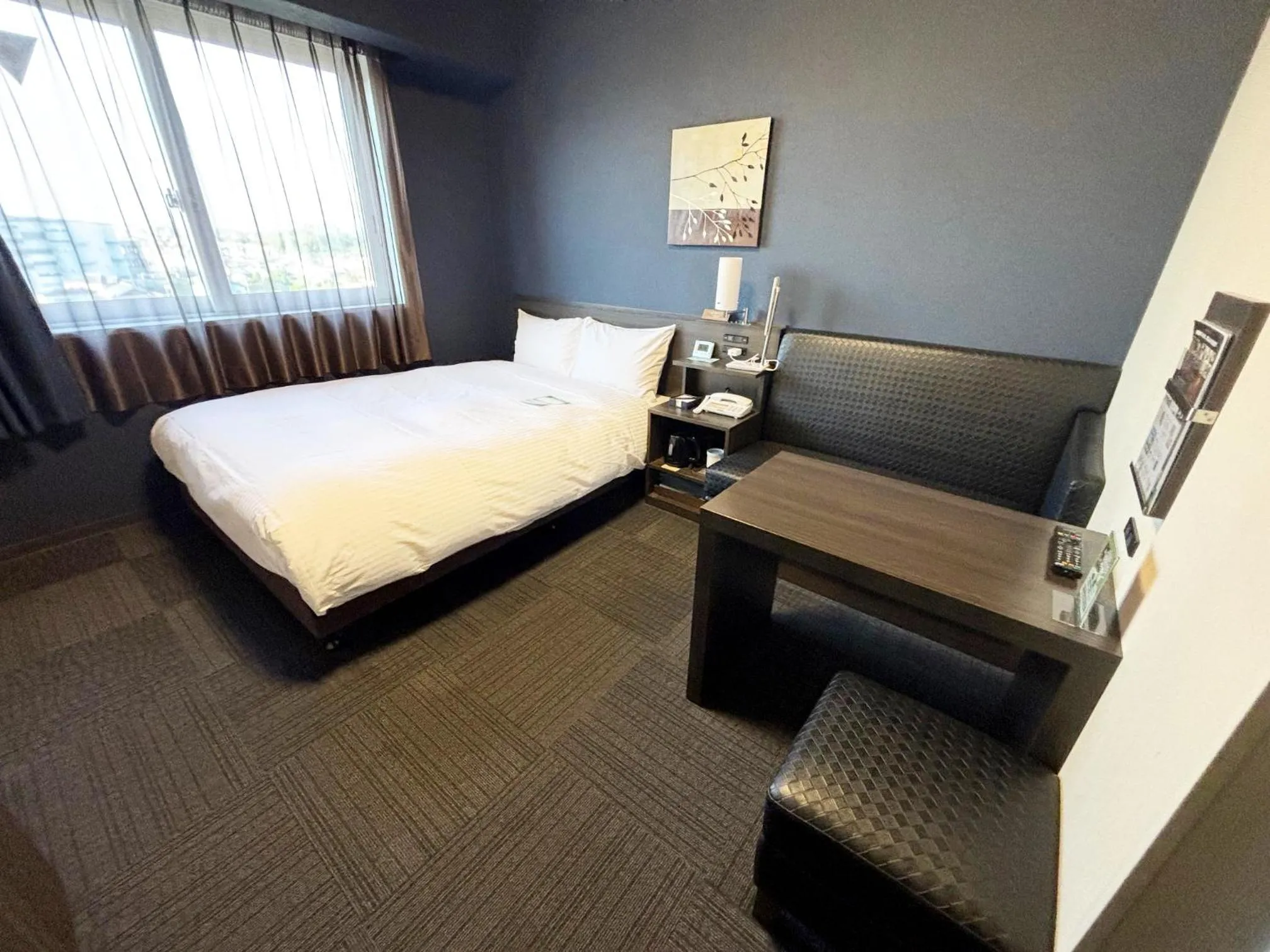 Photo of the whole room, Bed in Hotel Route Inn Osaka Izumi -Kishiwada Izumi Inter-