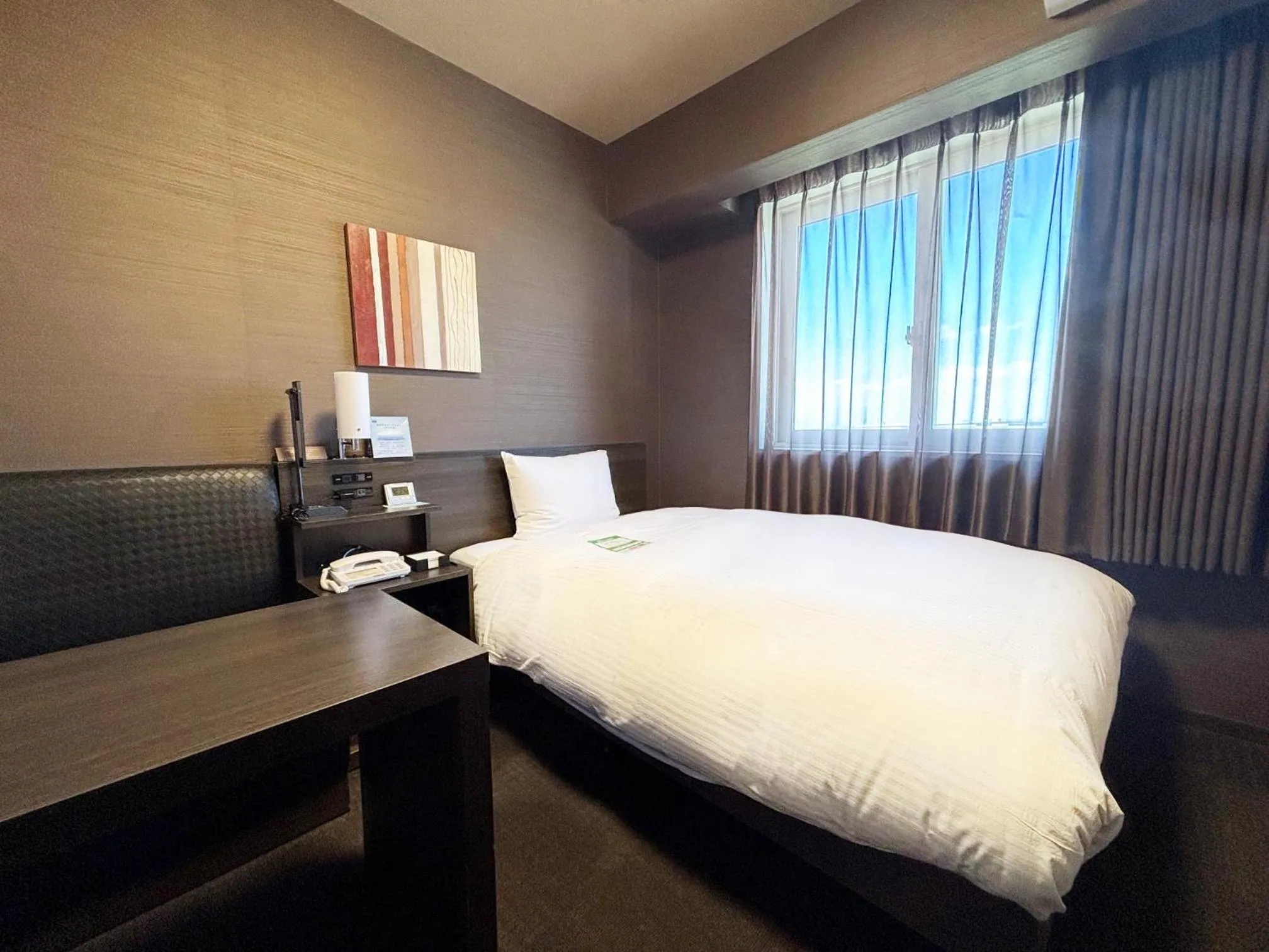 Photo of the whole room, Bed in Hotel Route Inn Osaka Izumi -Kishiwada Izumi Inter-