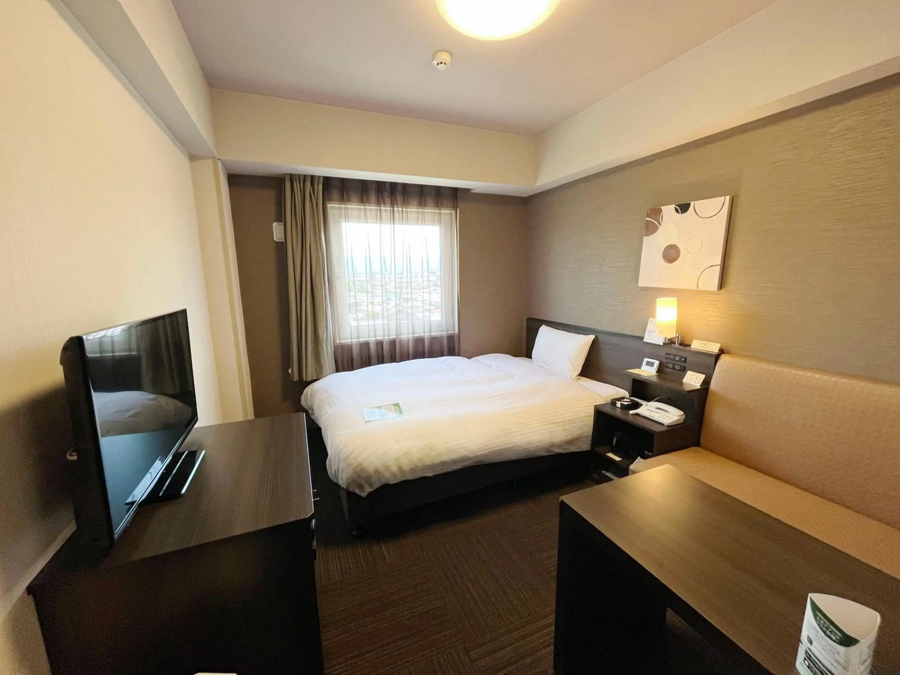 Bedroom, Bed in Hotel Route-Inn Higashiomi Yokaichi Ekimae