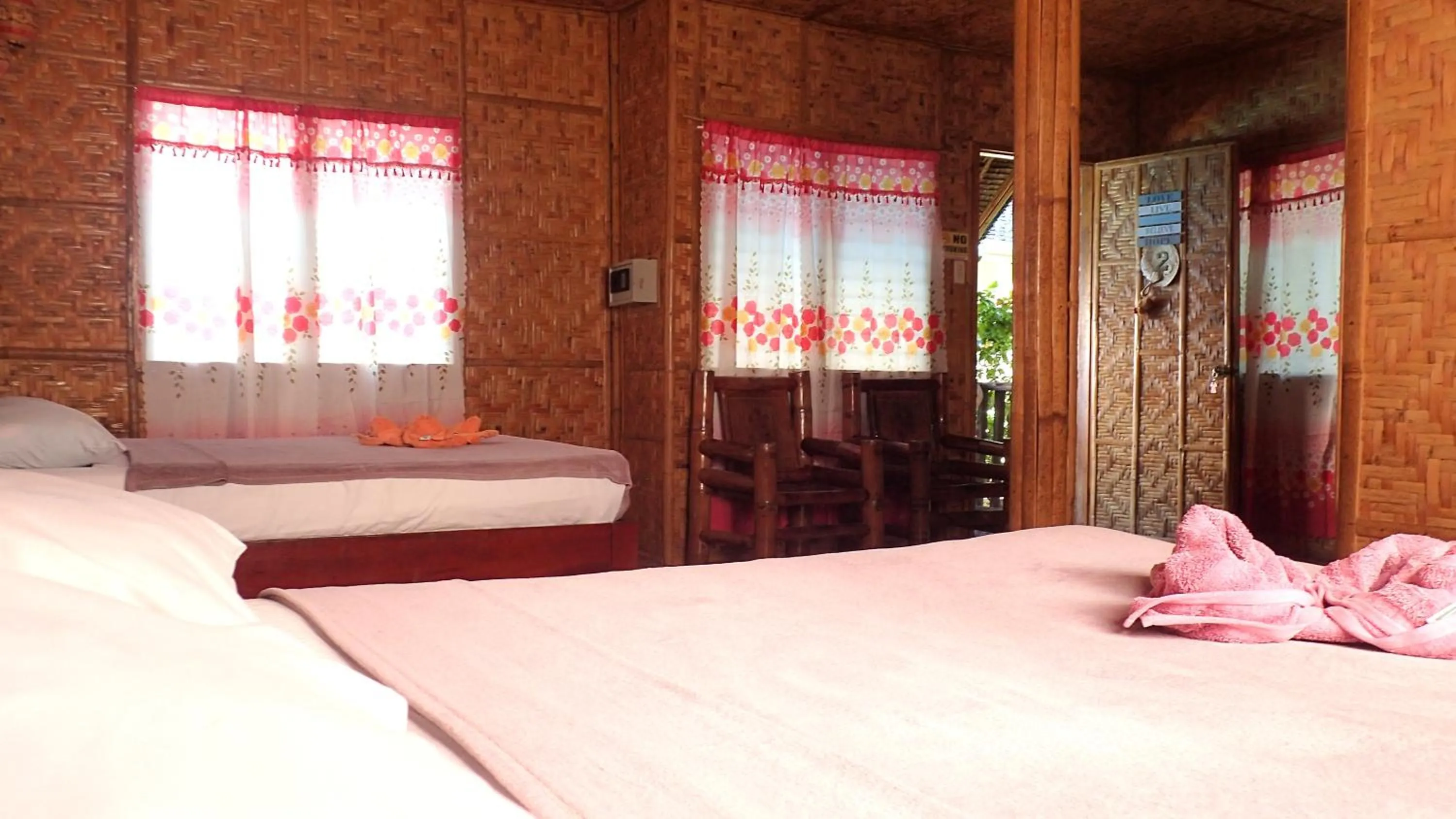 Bed in Island Tiki Paradise Resort