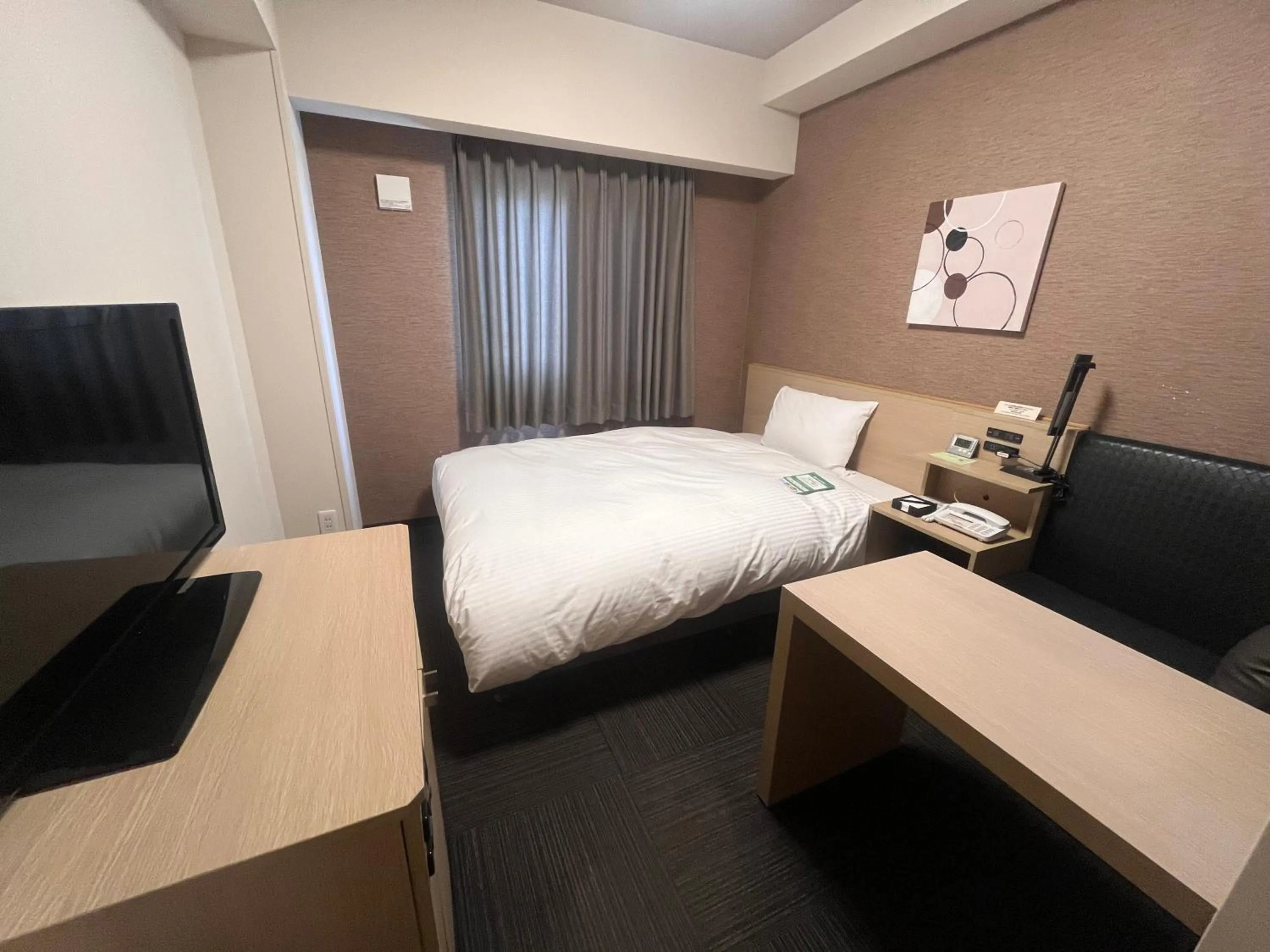 Photo of the whole room, Bed in ​Hotel Route-Inn Ube​