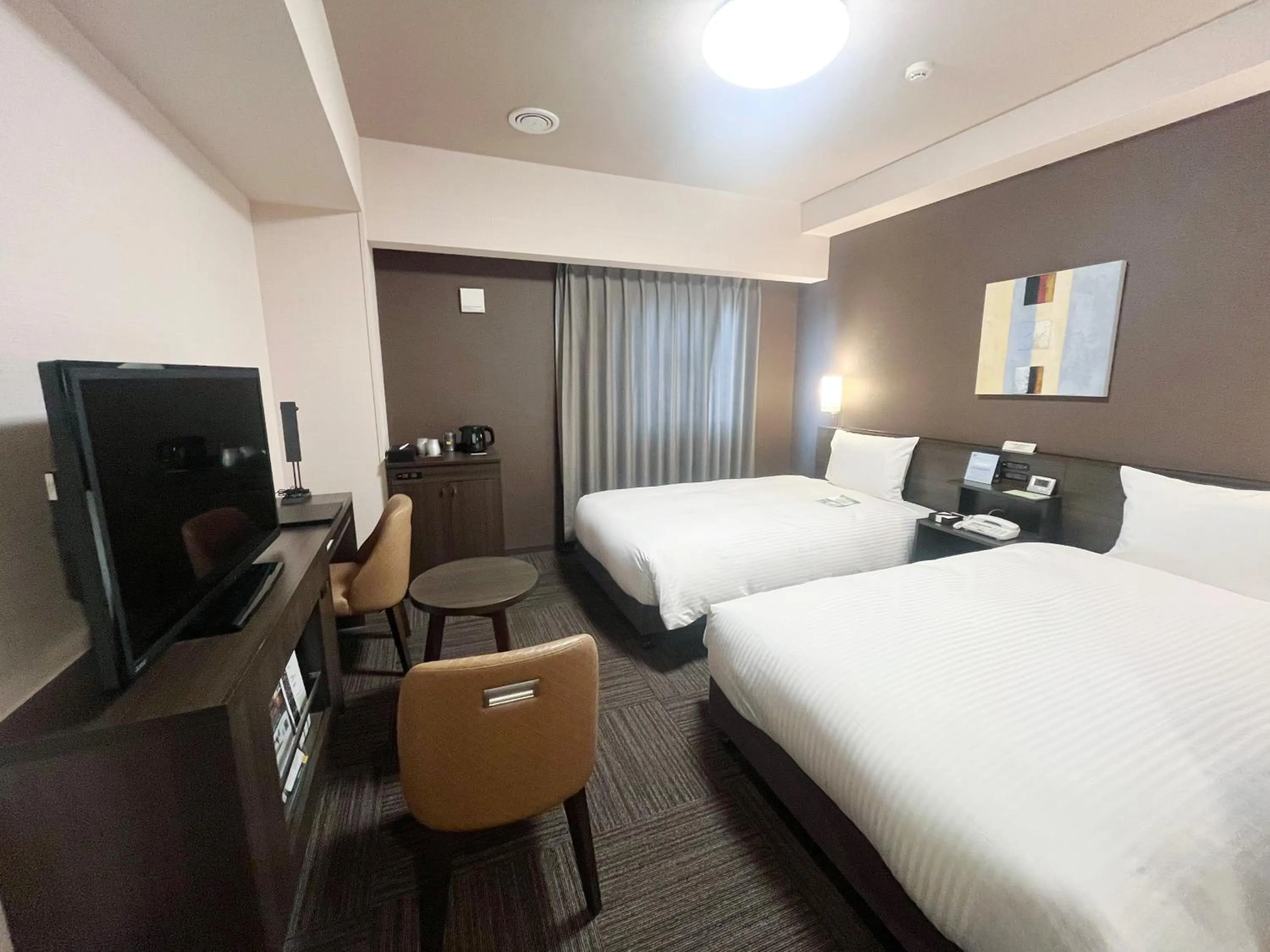 Photo of the whole room, Bed in ​Hotel Route-Inn Ube​