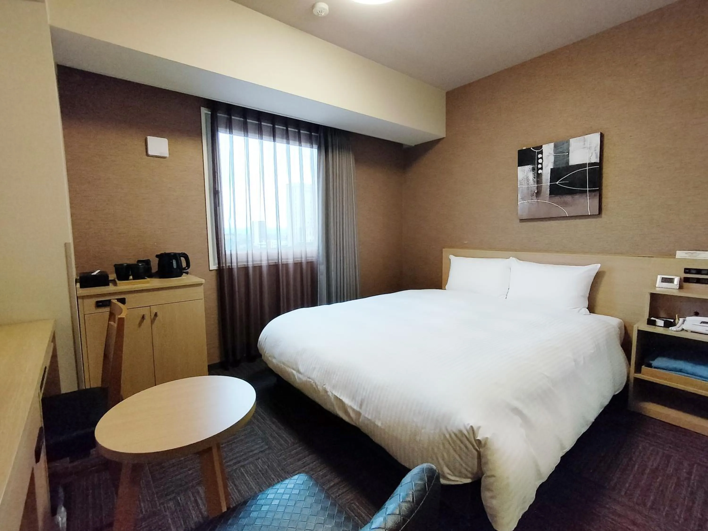 Photo of the whole room, Bed in Hotel Route-Inn Takaoka Ekimae