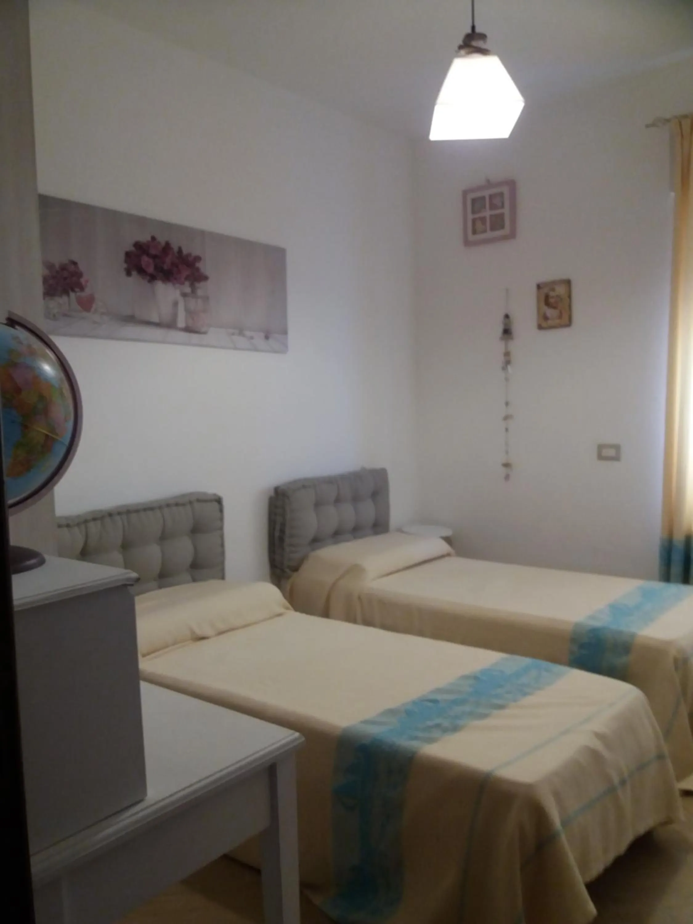 Bed in Appartamento Casa Ilaria