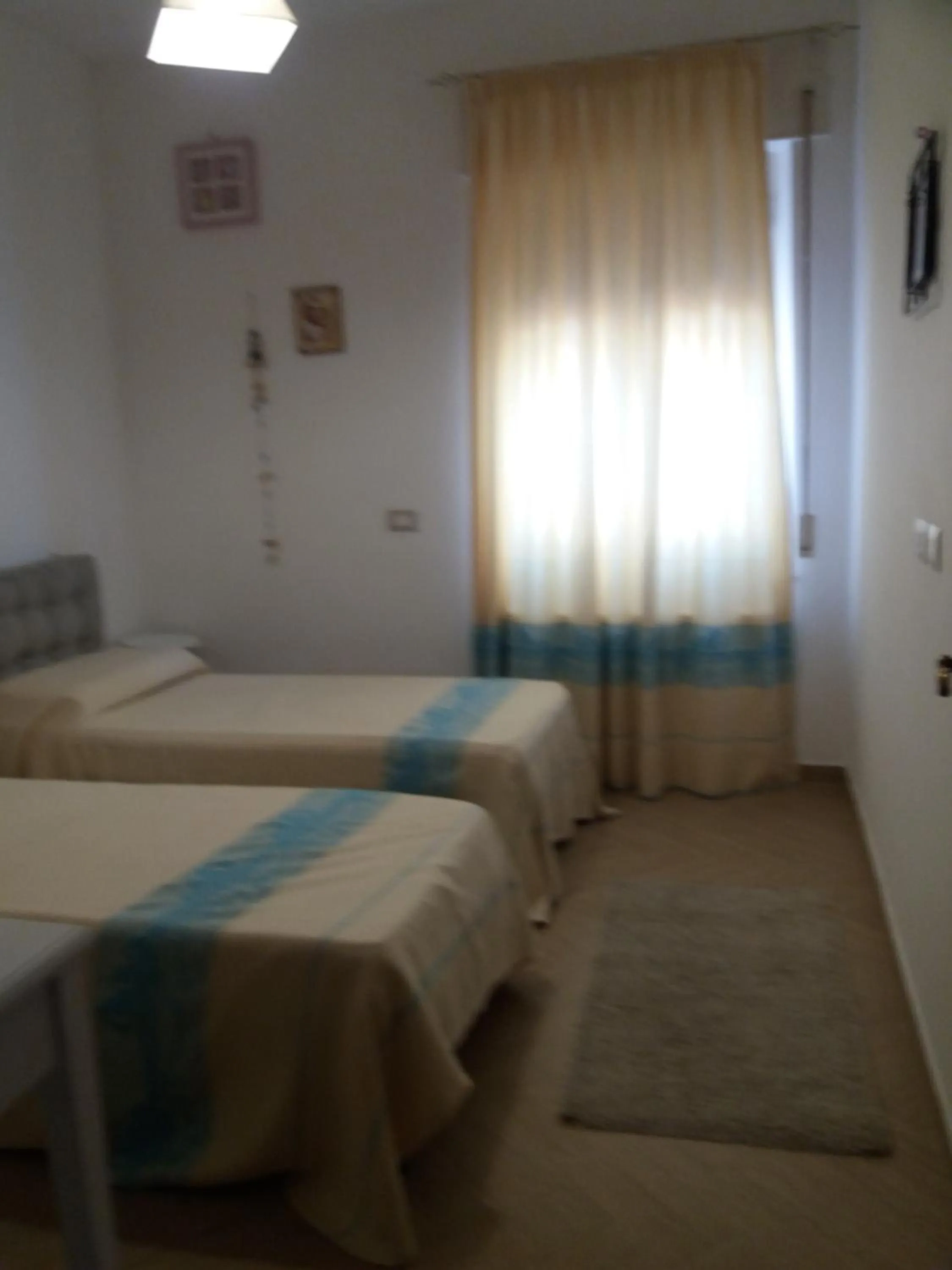 Bed in Appartamento Casa Ilaria