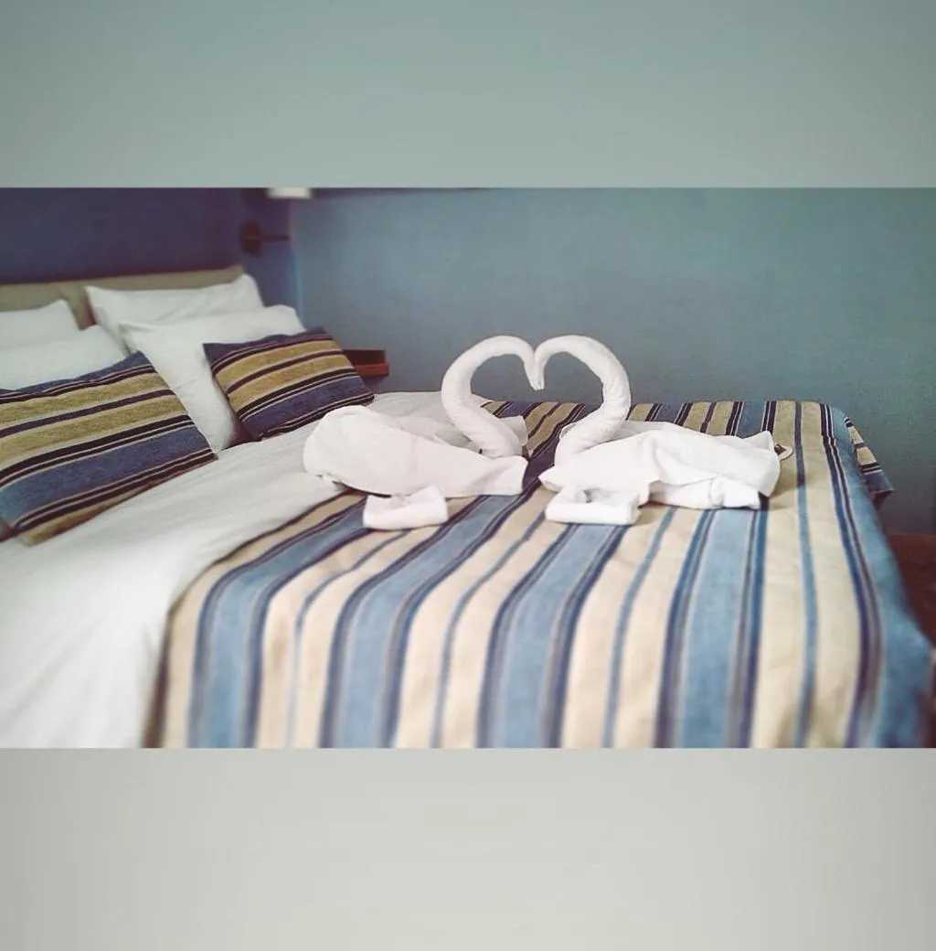 Bed in Aragonese Luxury Rooms