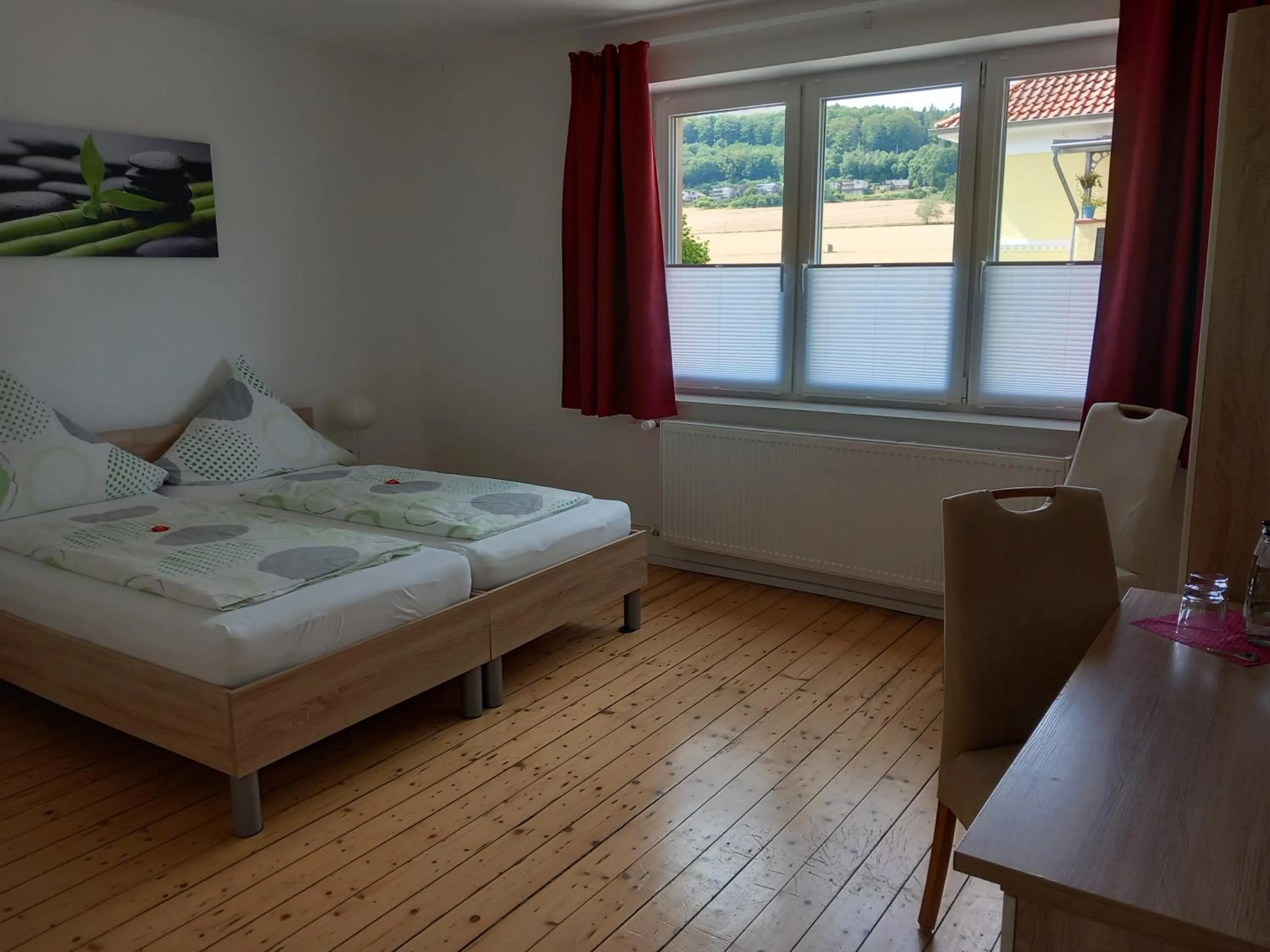 Photo of the whole room, Bed in Gästehaus Laßbruch