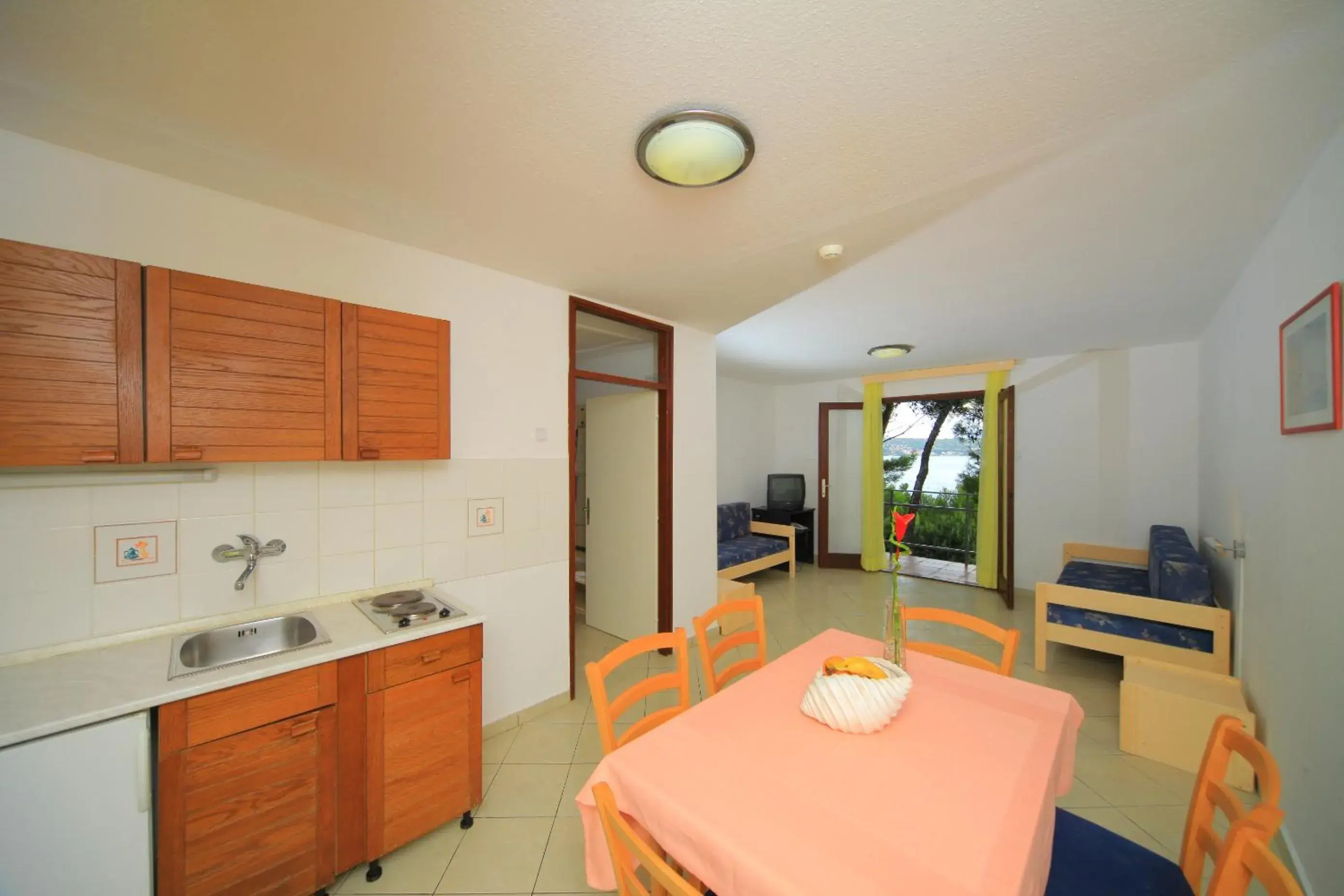 Kitchen or kitchenette, Dining Area in Apartments Kanegra Plava Laguna