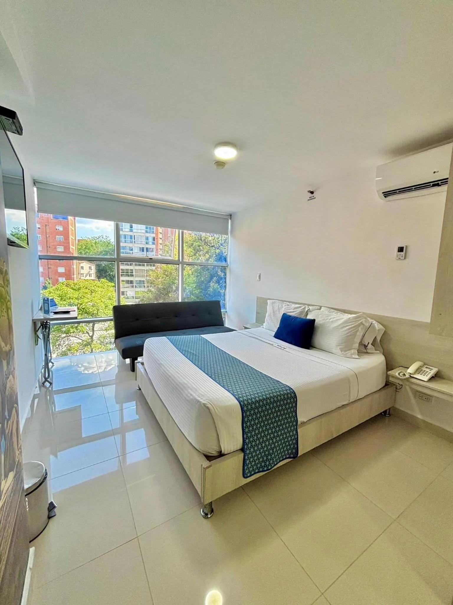 Bed in Hotel Laureles Plaza
