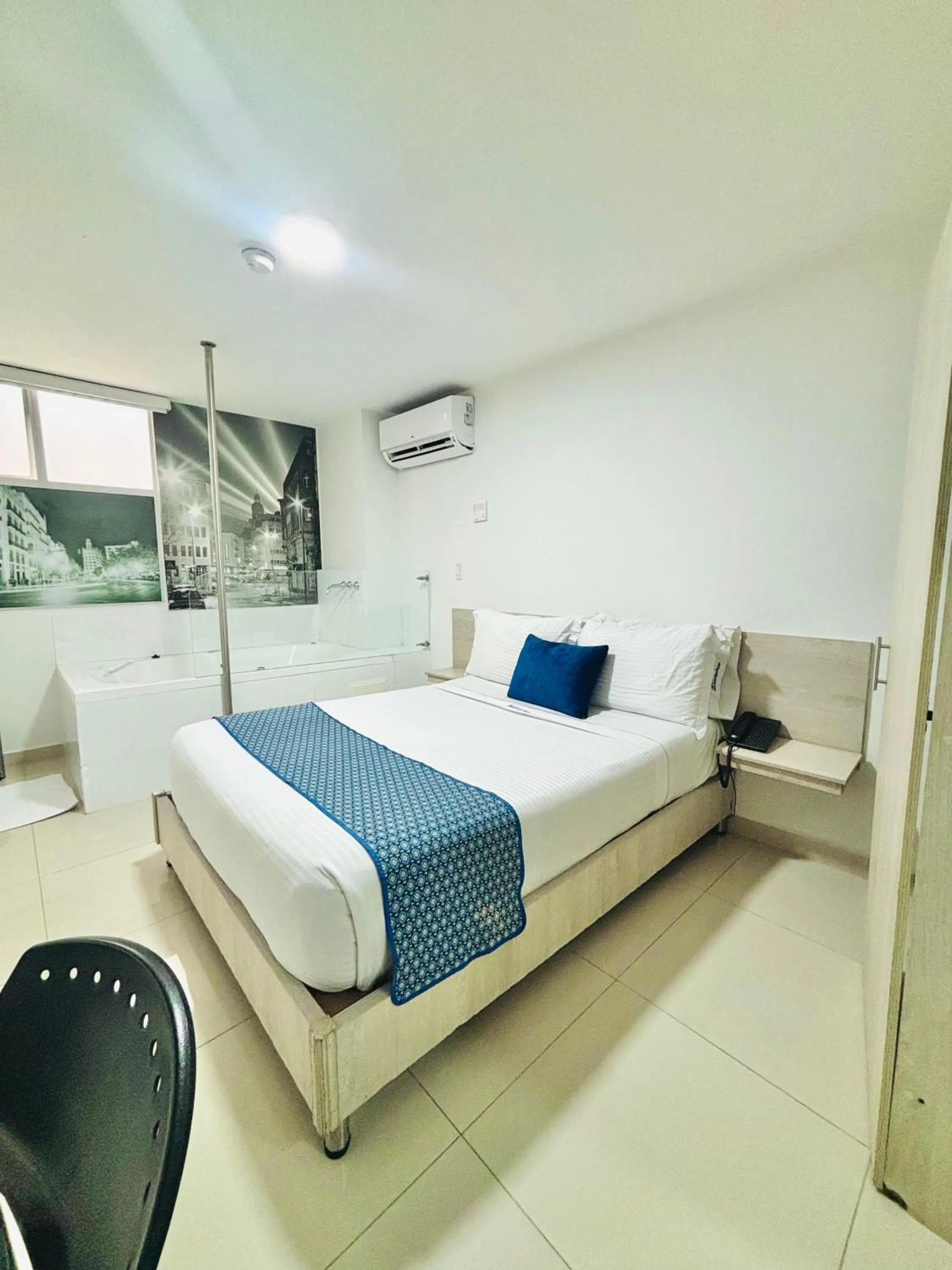 Bed in Hotel Laureles Plaza