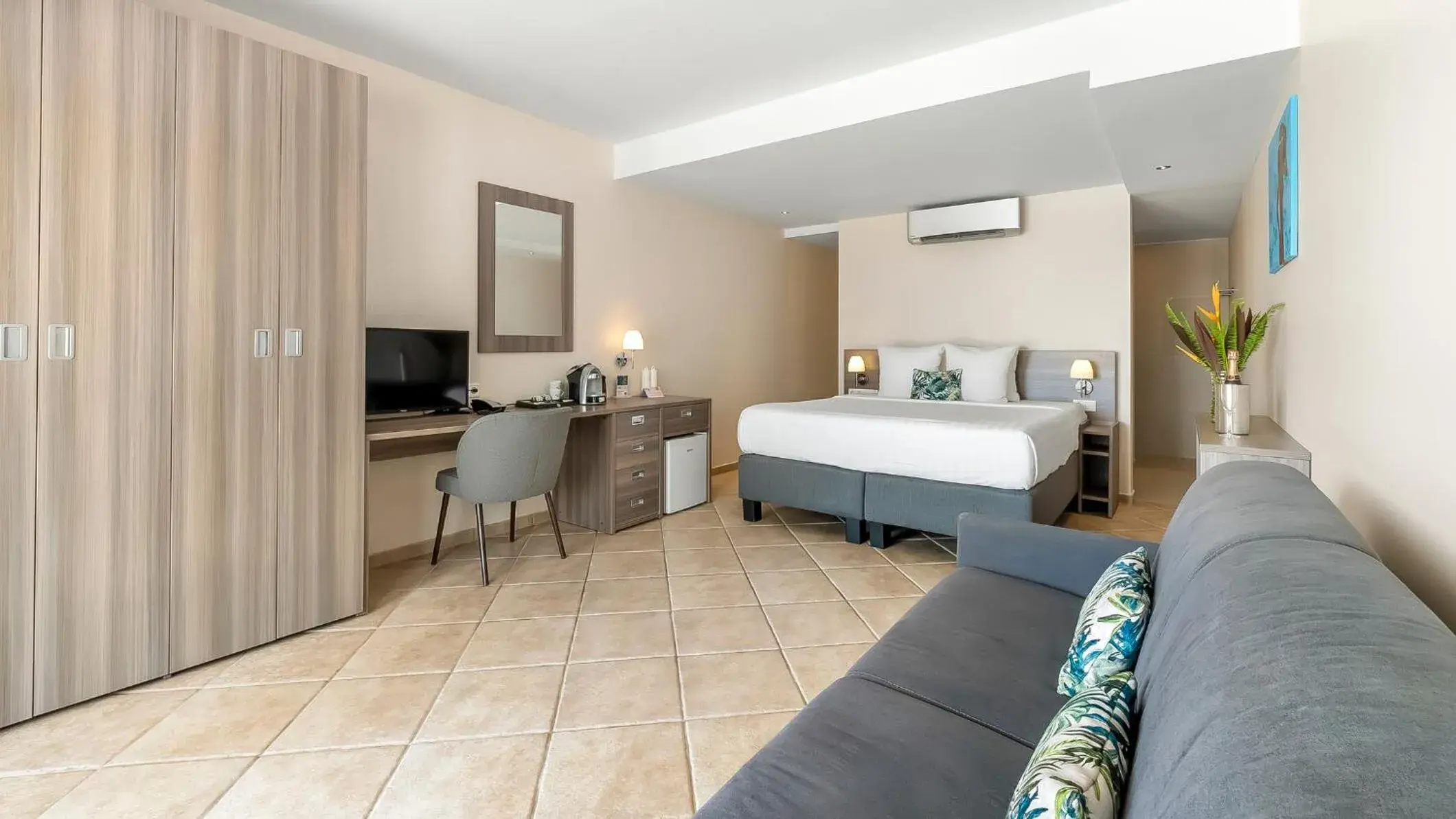 Photo of the whole room, Bed in LionsDive Beach Resort Photo of the whole room, Bed in LionsDive Beach Resort