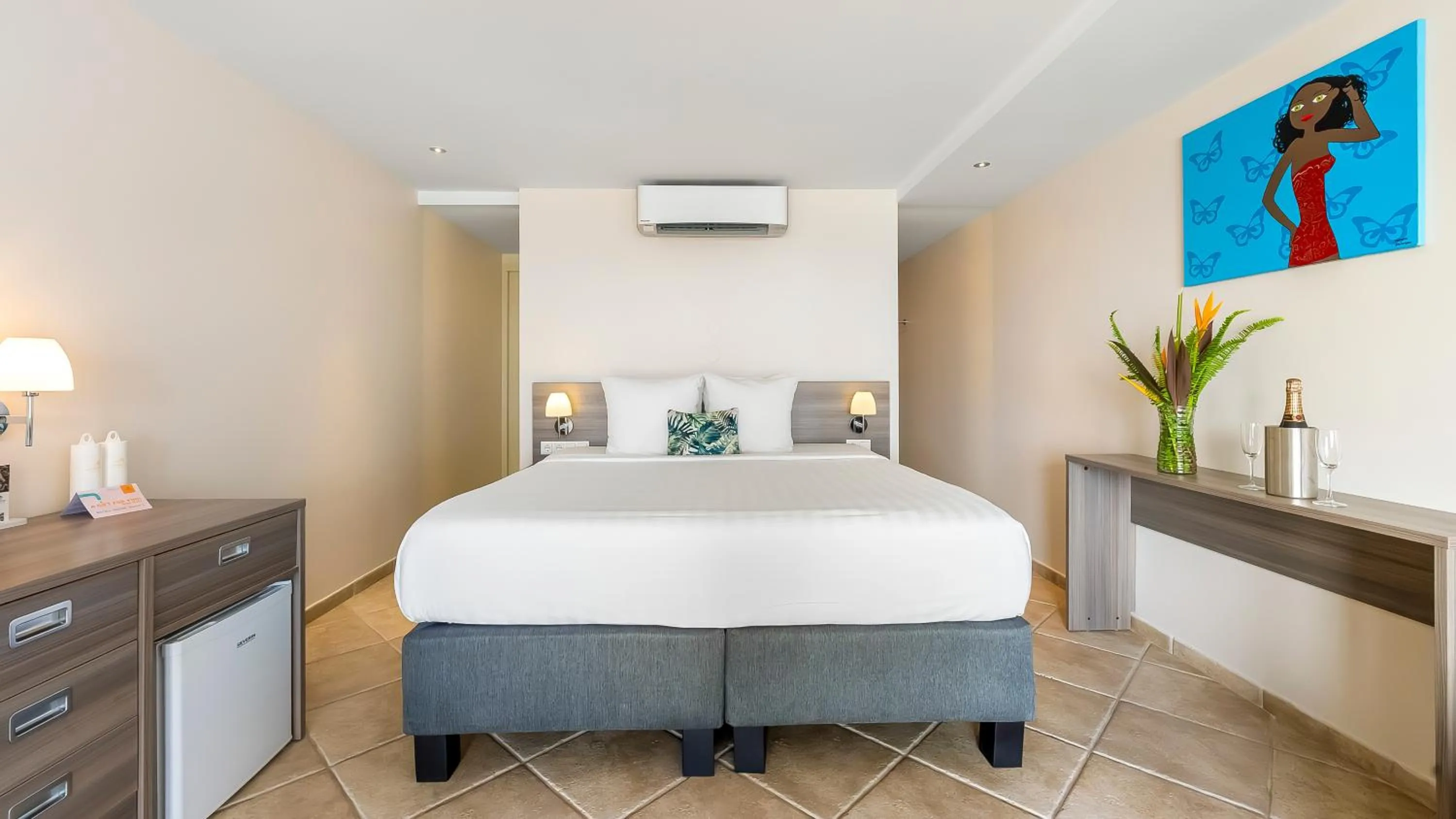 Photo of the whole room, Bed in LionsDive Beach Resort