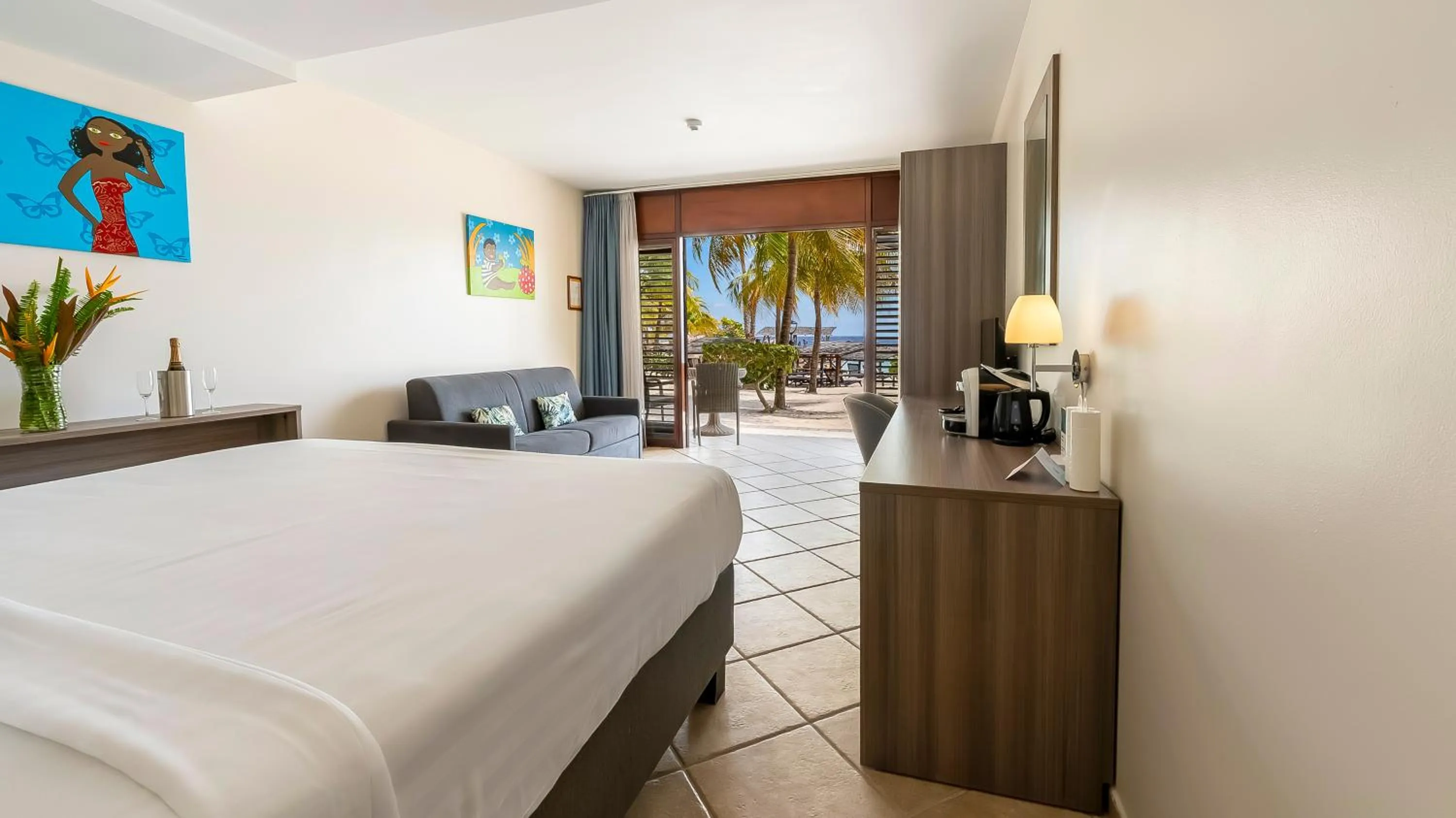 Photo of the whole room, Bed in LionsDive Beach Resort