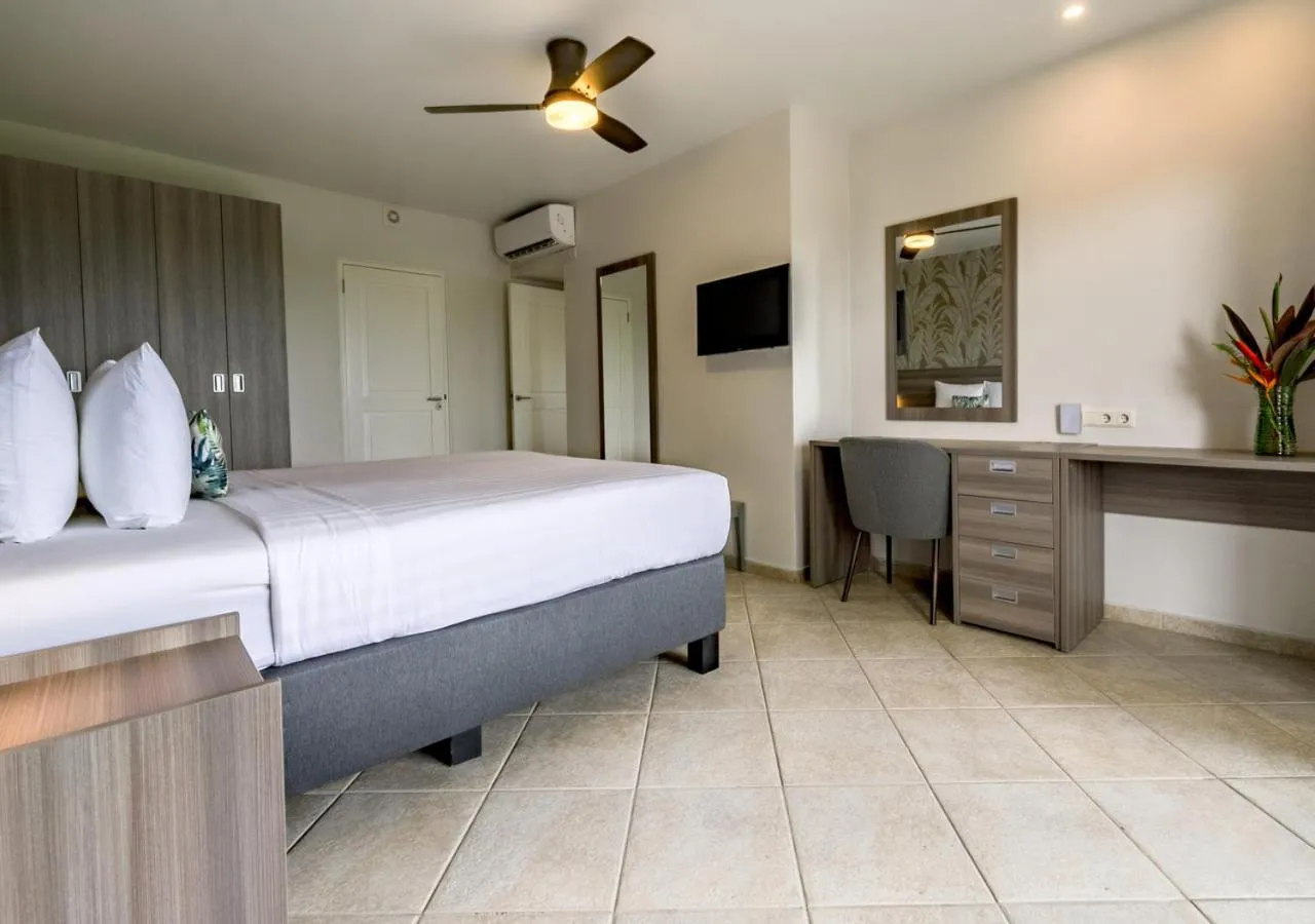 Bed in LionsDive Beach Resort