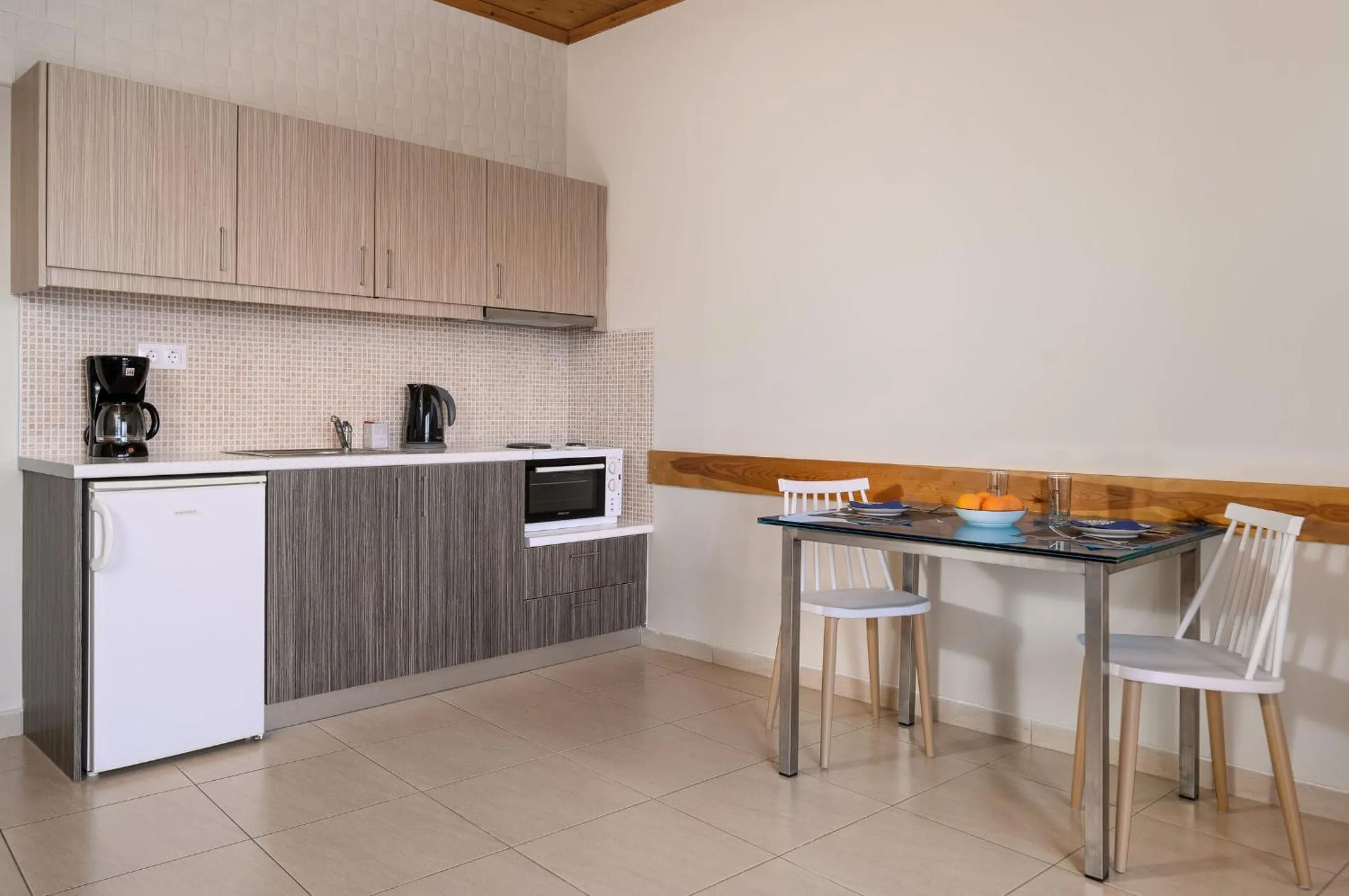 Kitchen or kitchenette in Minos Boutique Hotel