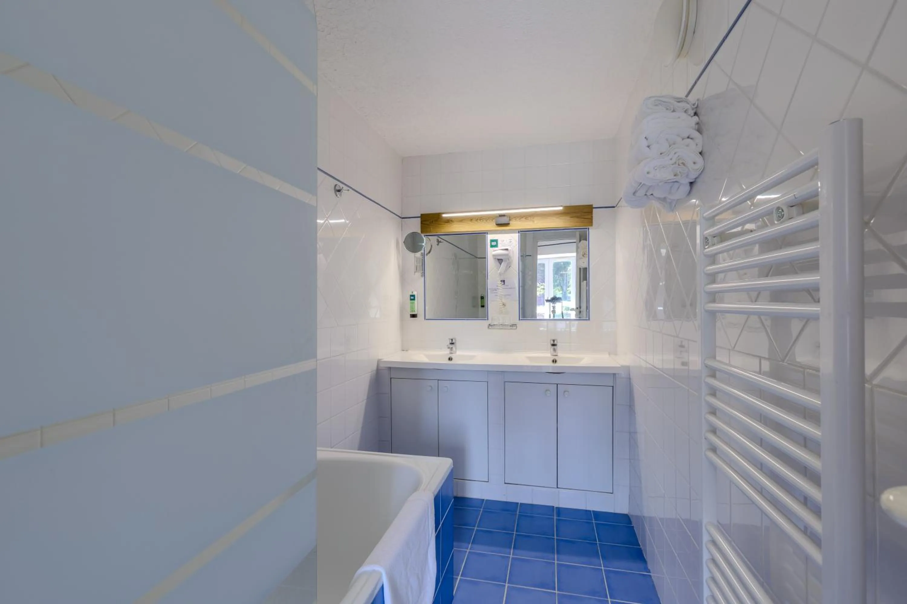 Bathroom in Logis Hôtel Le Manoir Des Portes