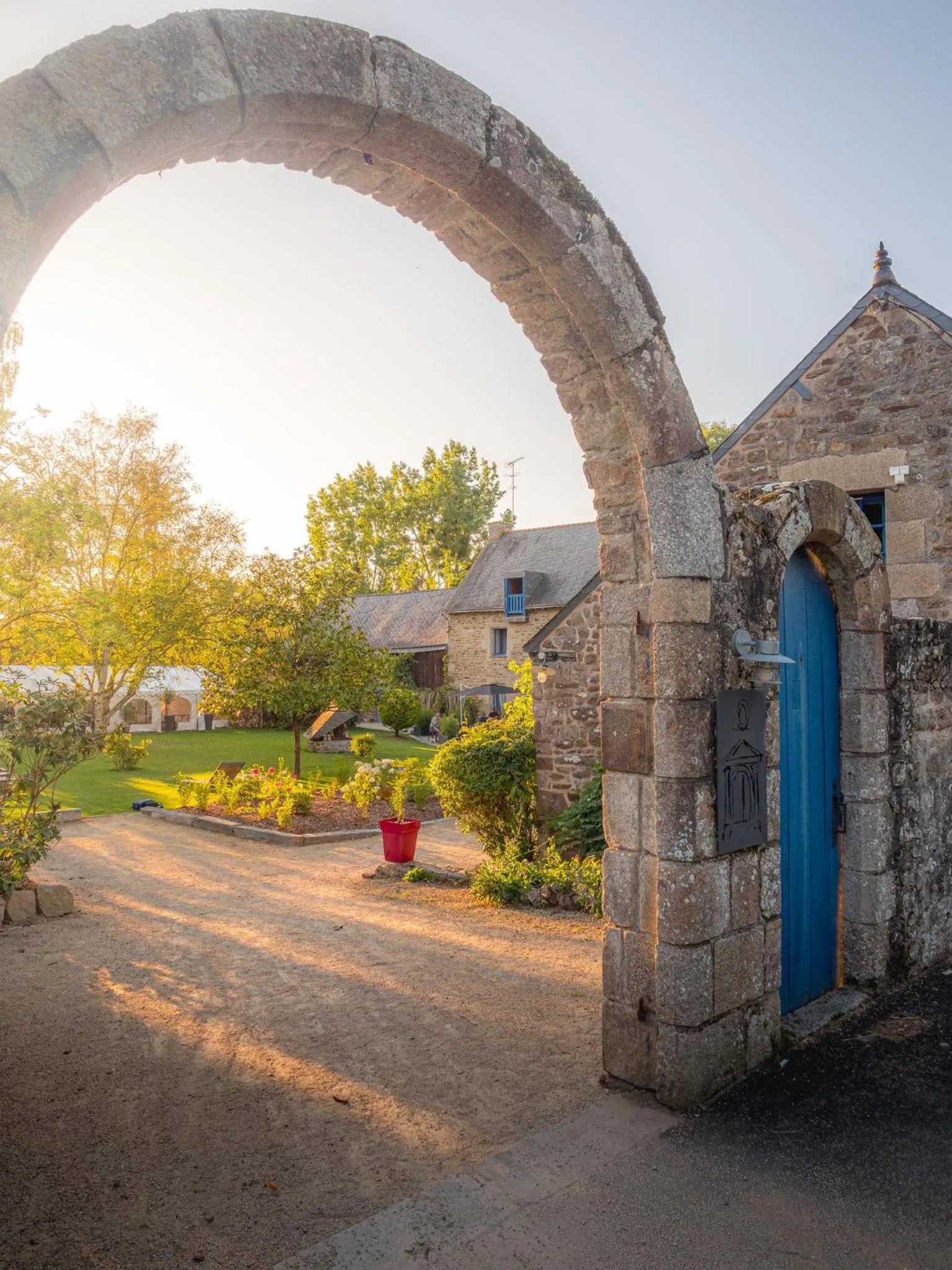 Garden view in Logis Hôtel Le Manoir Des Portes