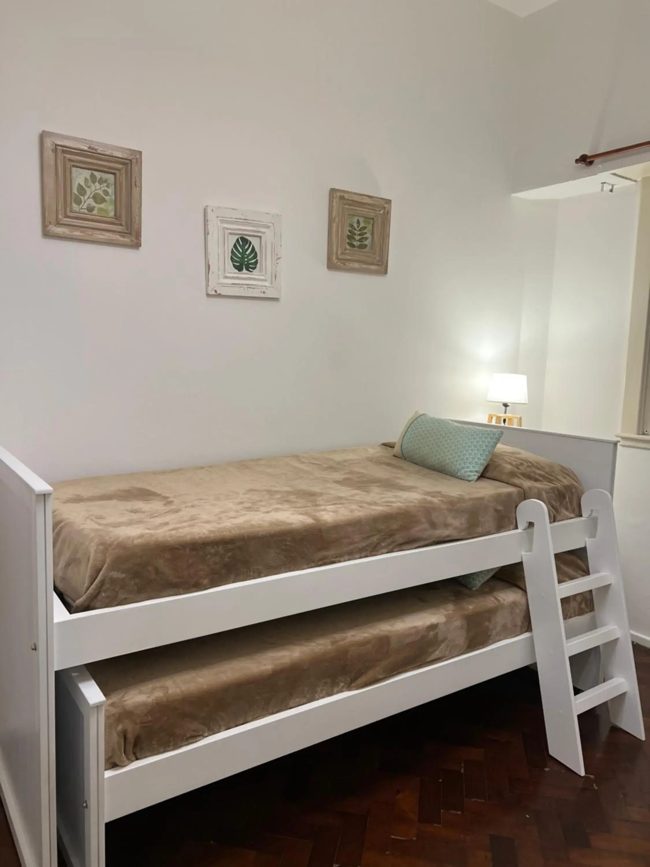 Bed in Sucre Suites Bed in Sucre Suites