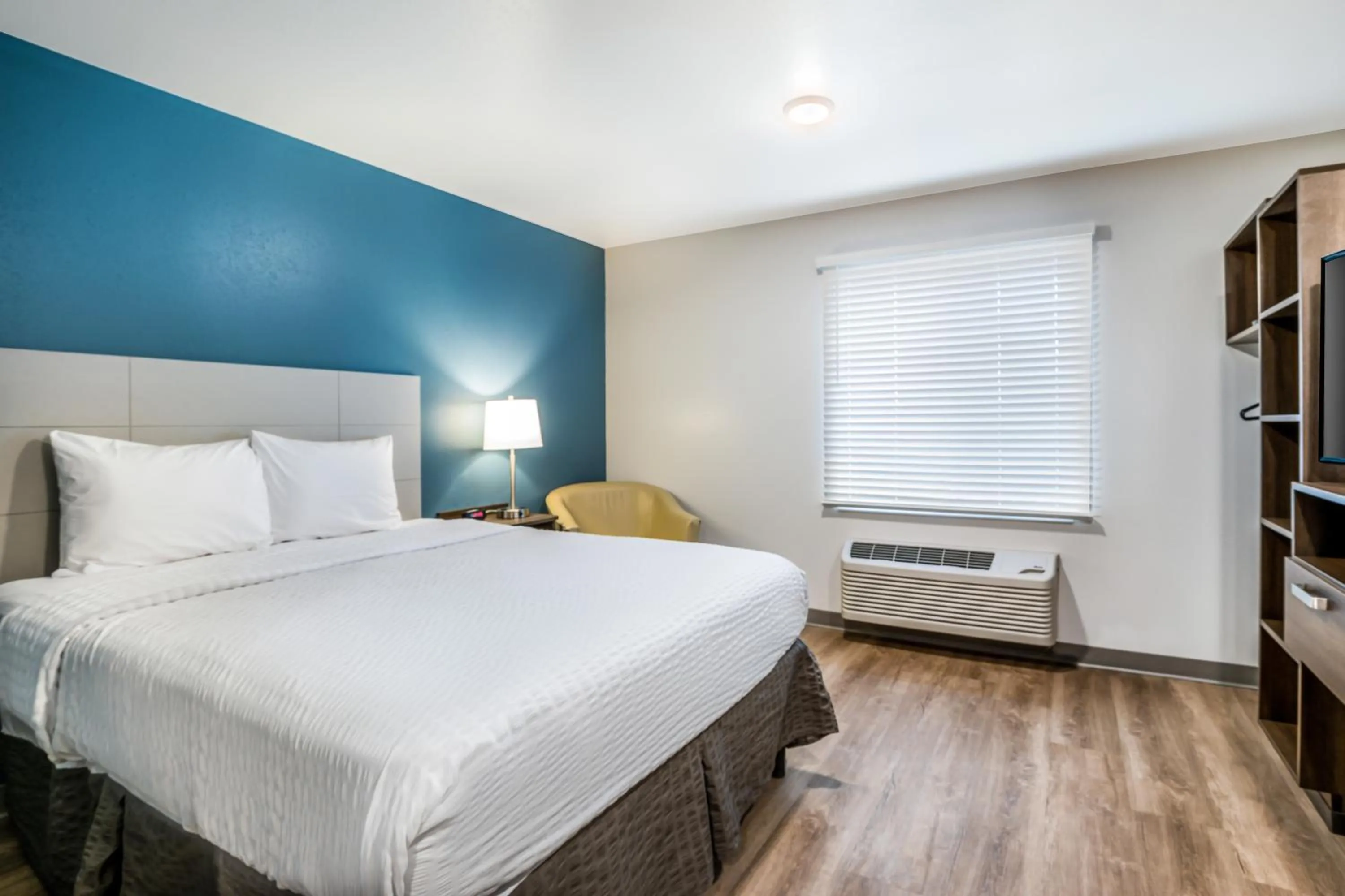 Bed in WoodSpring Suites Bakersfield East