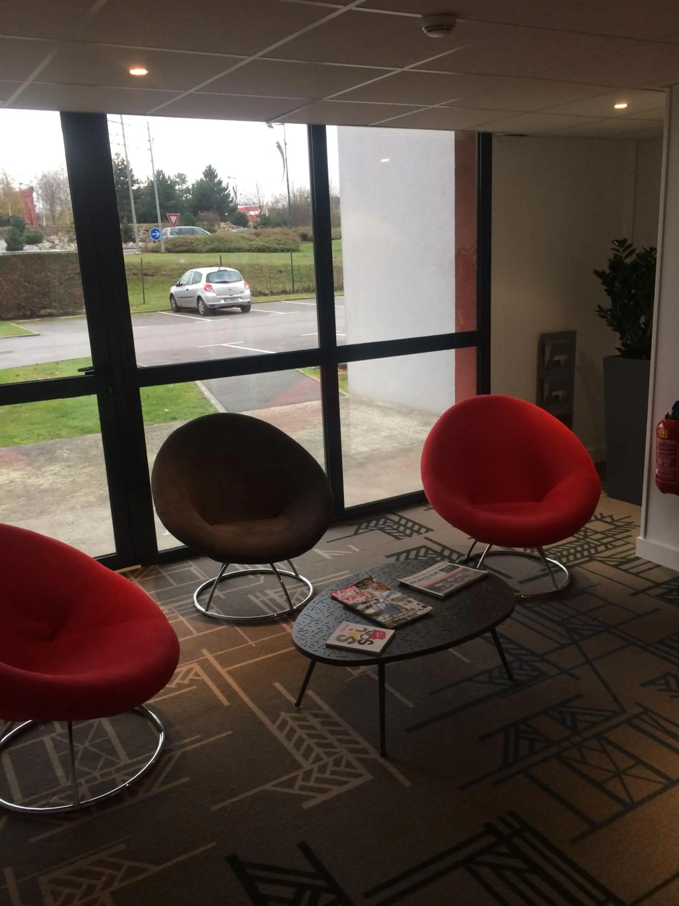 Seating area in ibis Styles Rouen Val De Reuil
