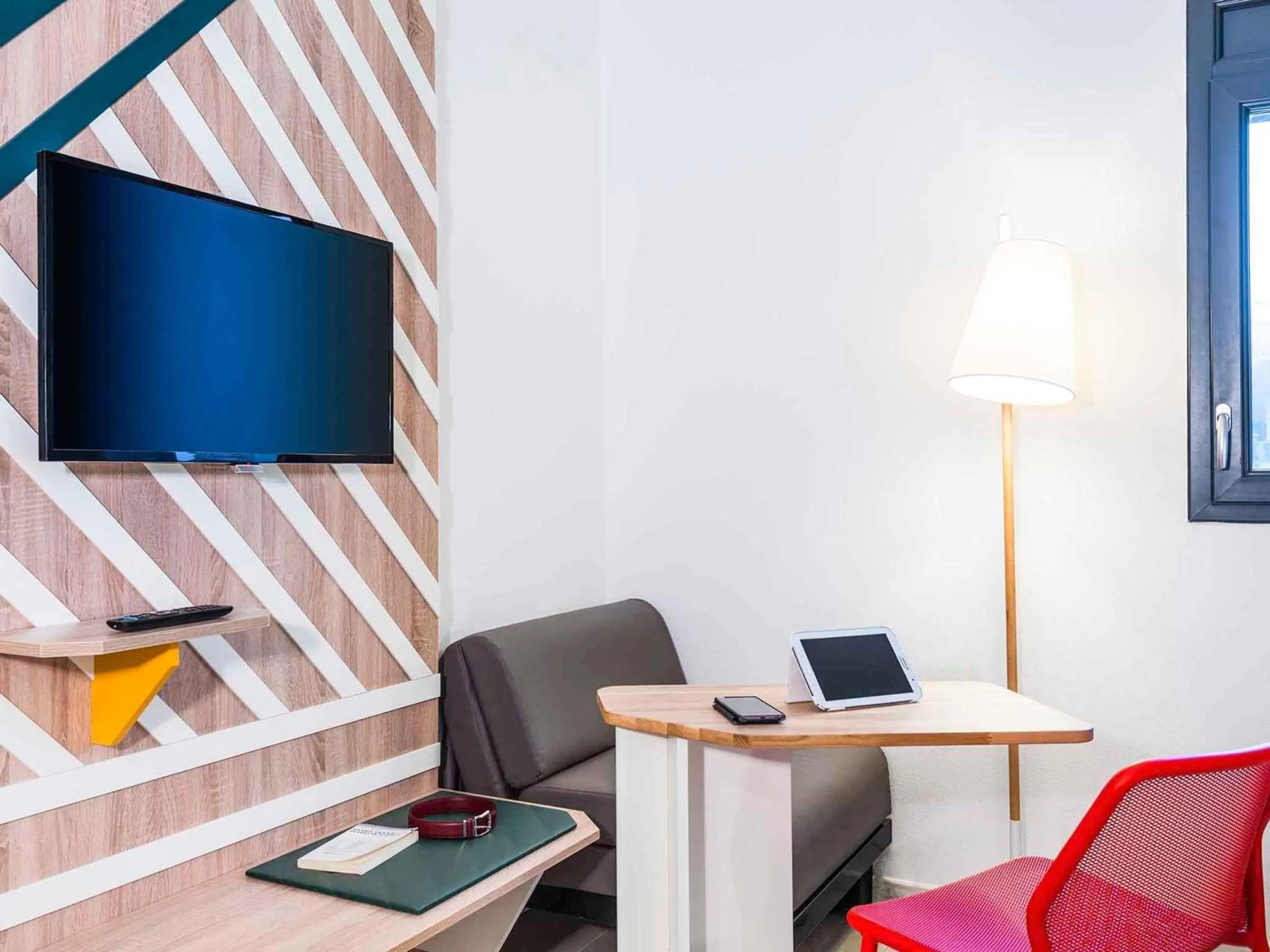 Bedroom in ibis Styles Rouen Val De Reuil