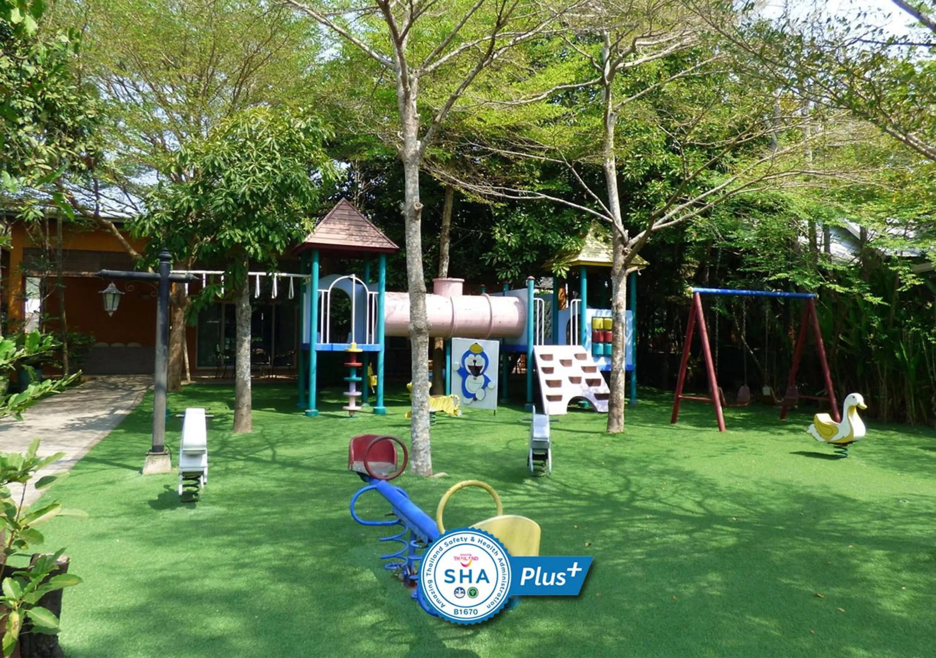 Children play ground in Baan Amphawa Resort & Spa - SHA Certified