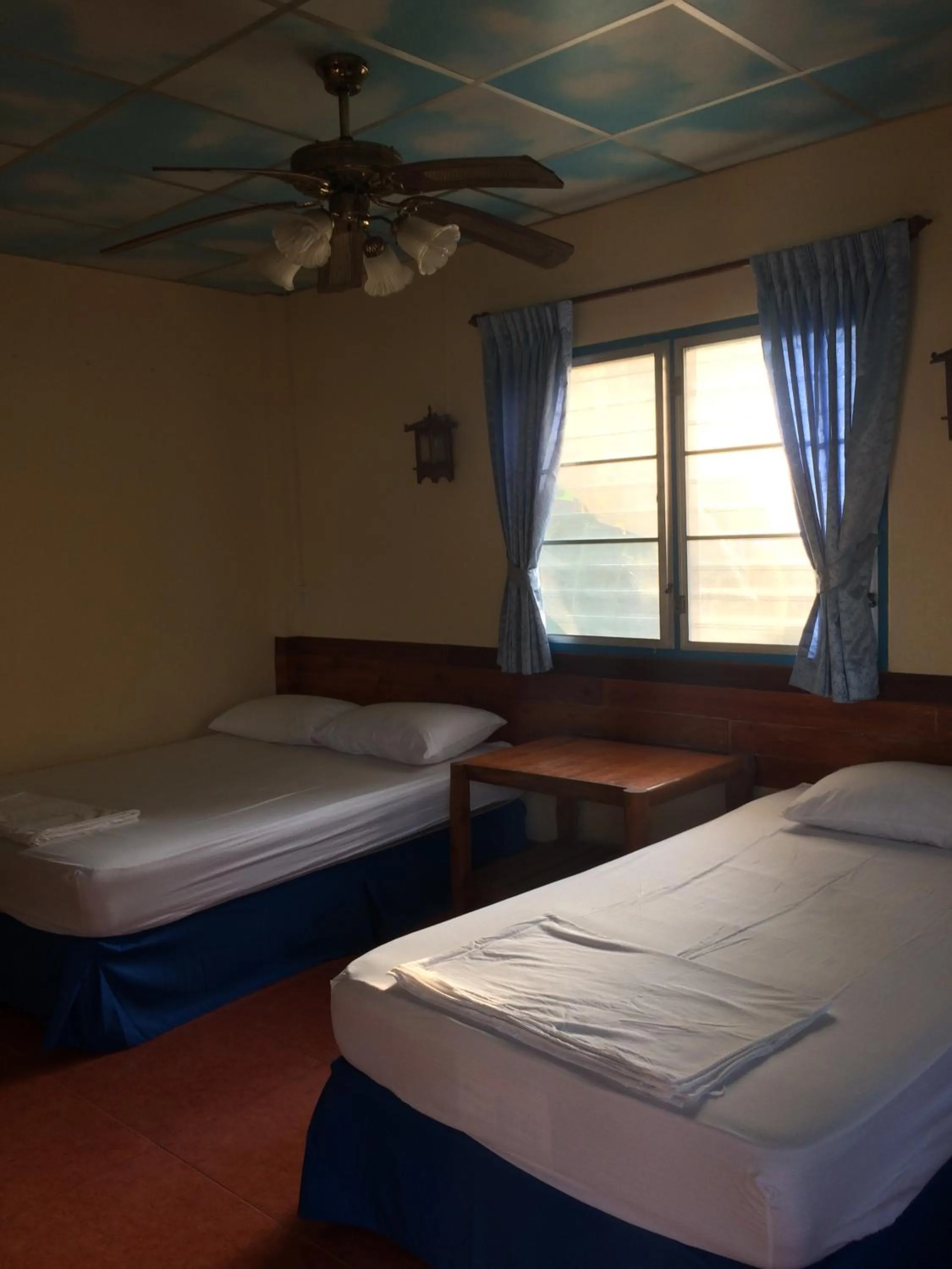 Bed in Tropicana Khophagan Resort Hotel