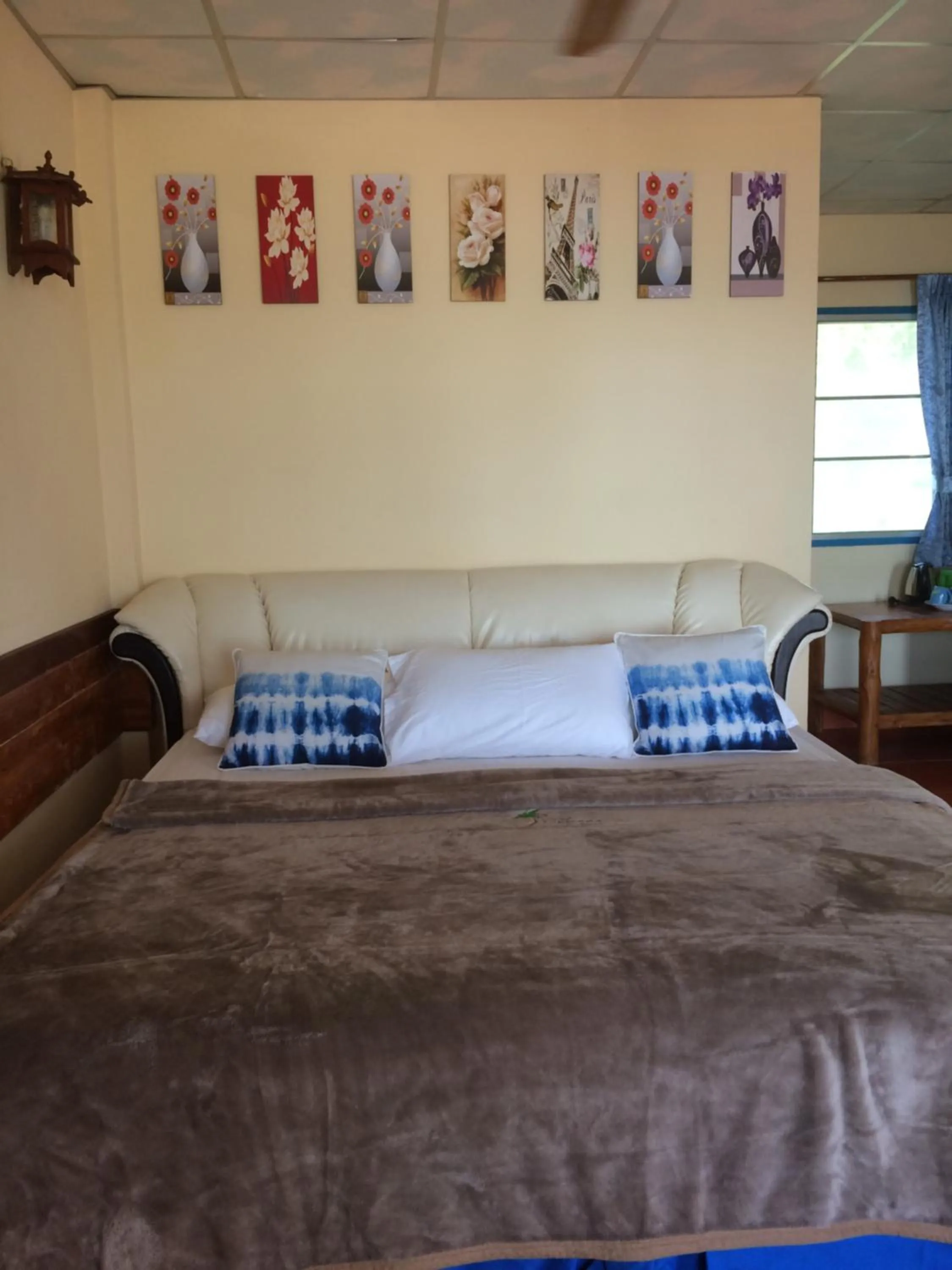 Bed in Tropicana Khophagan Resort Hotel