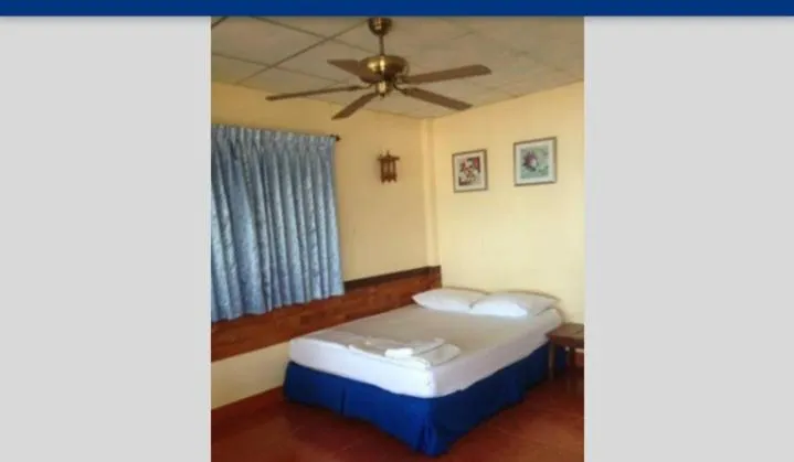 Bed in Tropicana Khophagan Resort Hotel