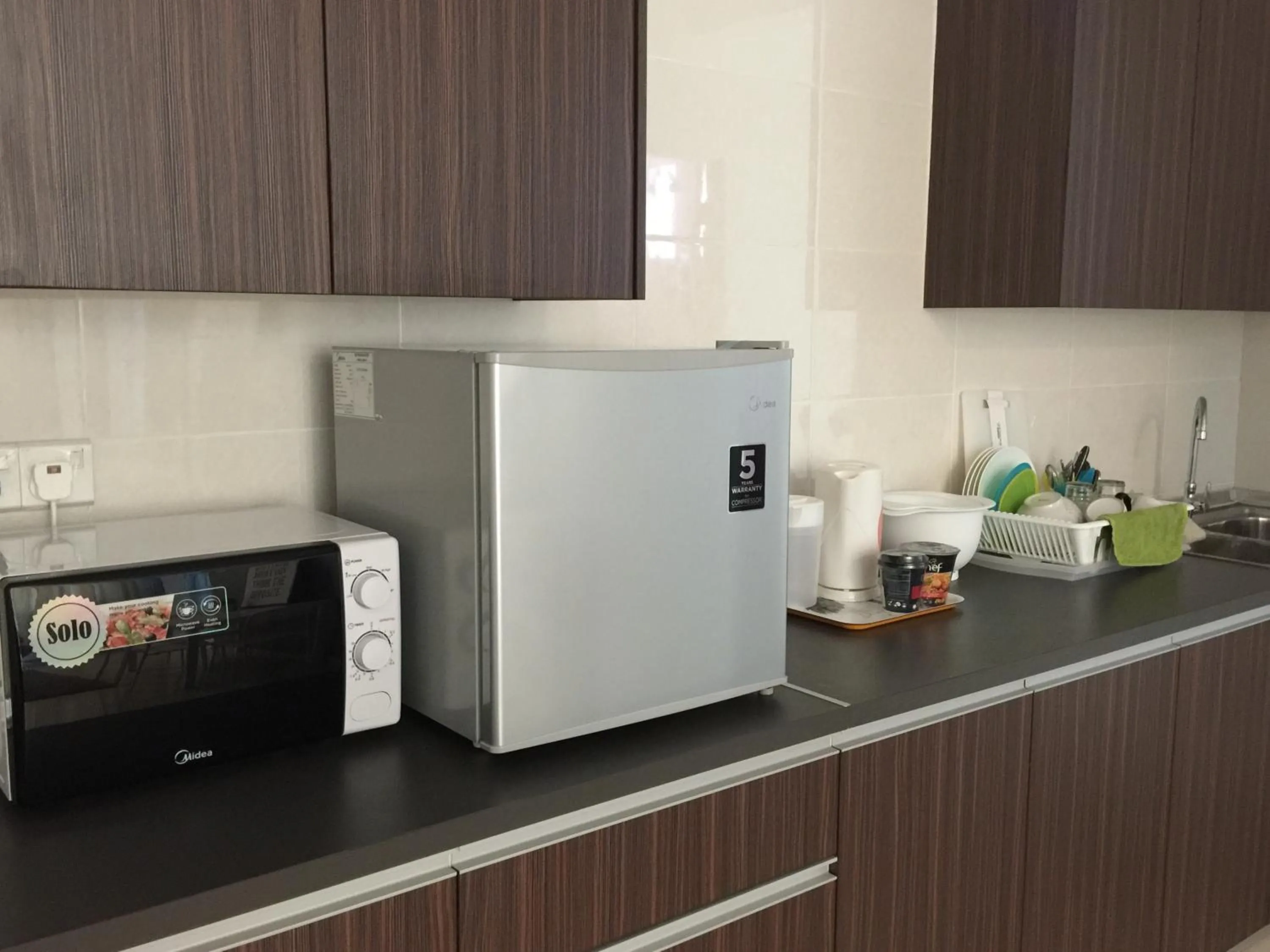 Kitchen or kitchenette in VIsta Home Homestay at Vista Alam