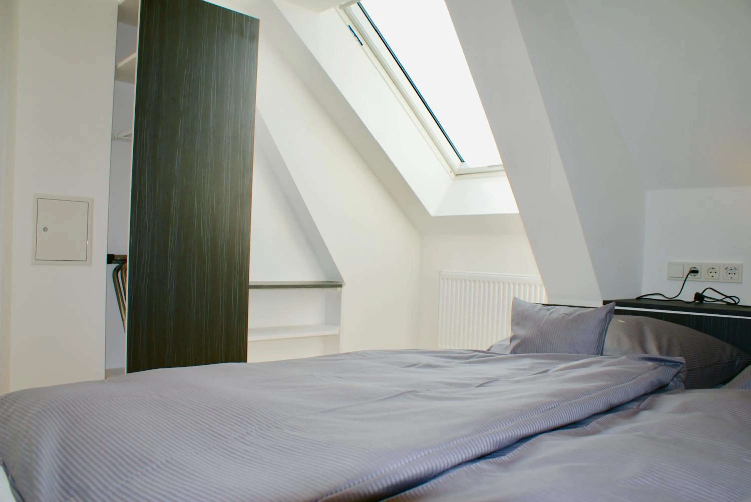 Photo of the whole room, Bed in Deichhotel Rose