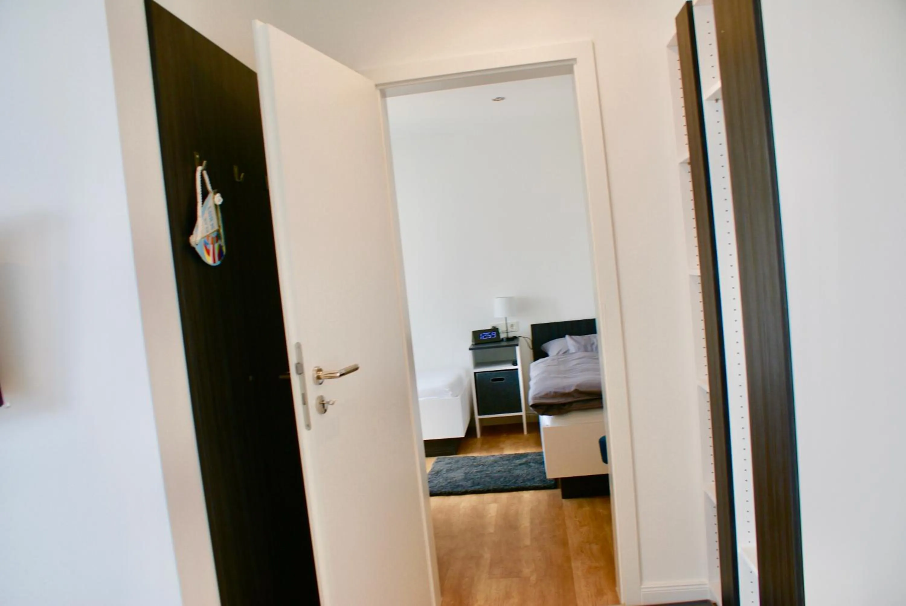 Photo of the whole room, Bed in Deichhotel Rose