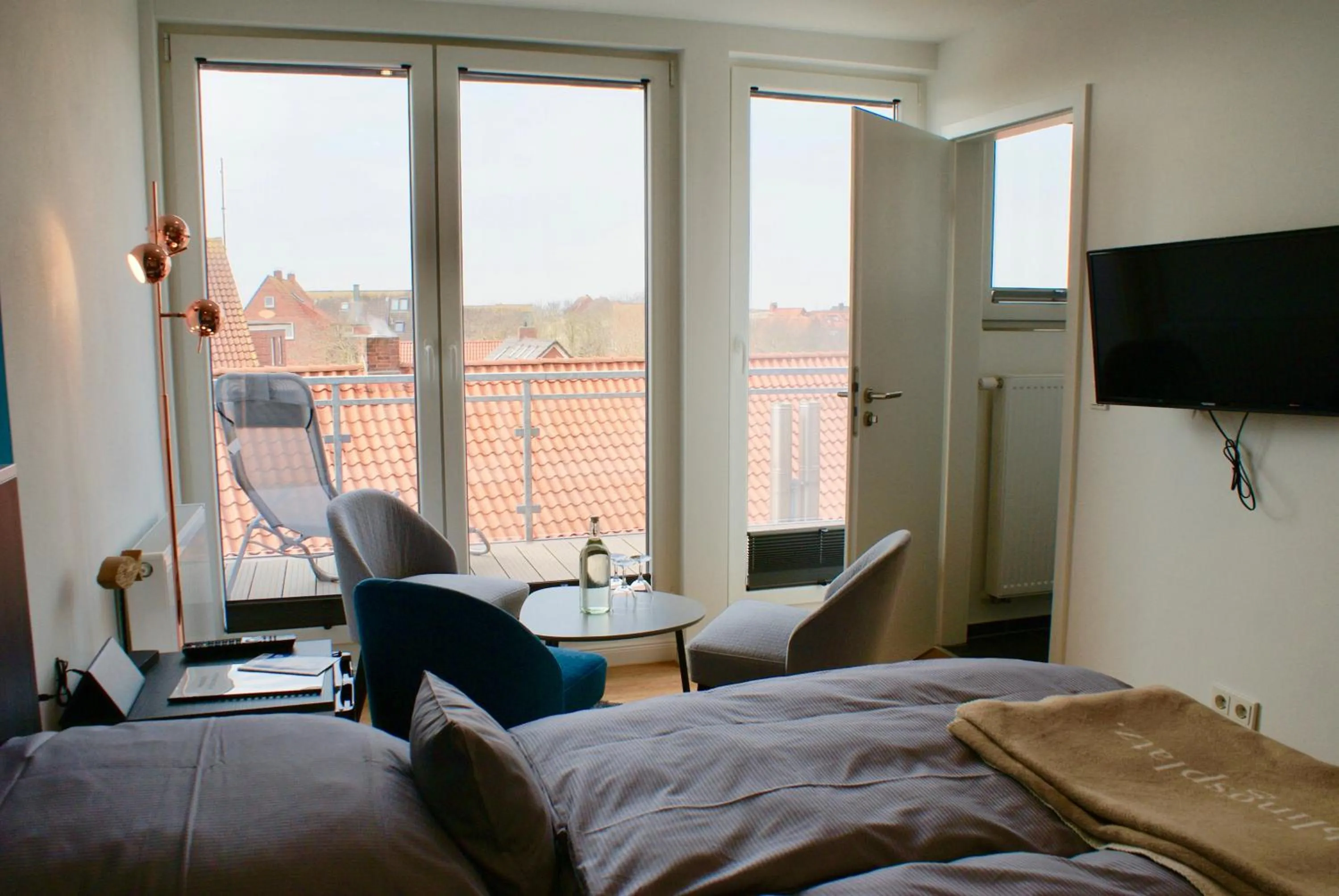 Photo of the whole room, Bed in Deichhotel Rose