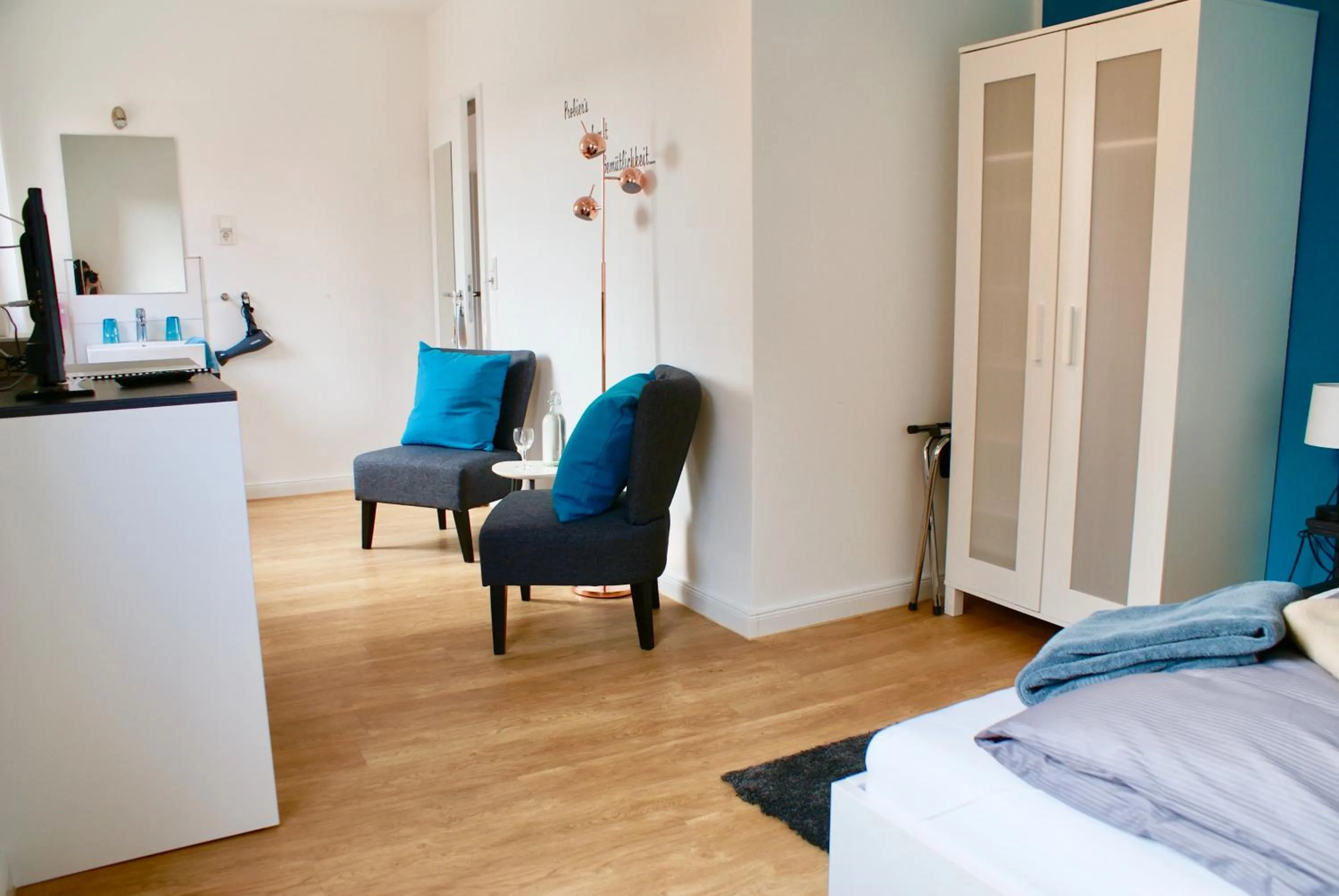 Photo of the whole room, Bed in Deichhotel Rose