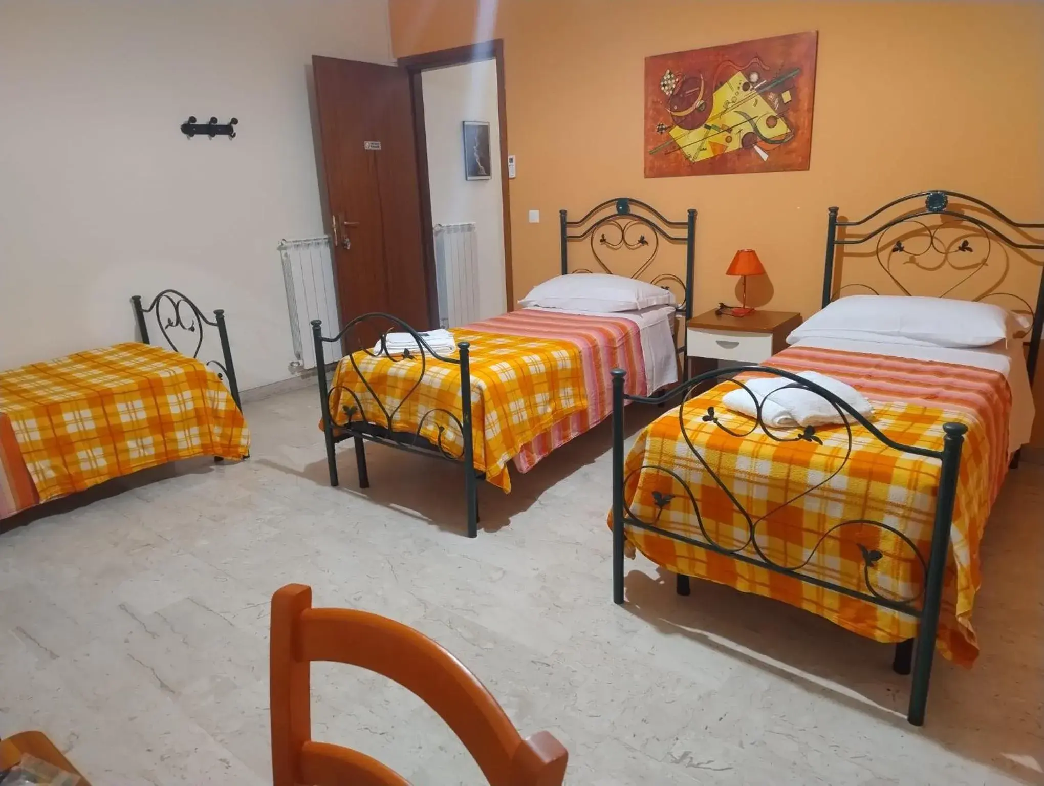 Triple Room - single occupancy in L'attico affittacamere B&B Triple Room - single occupancy in L'attico affittacamere B&B