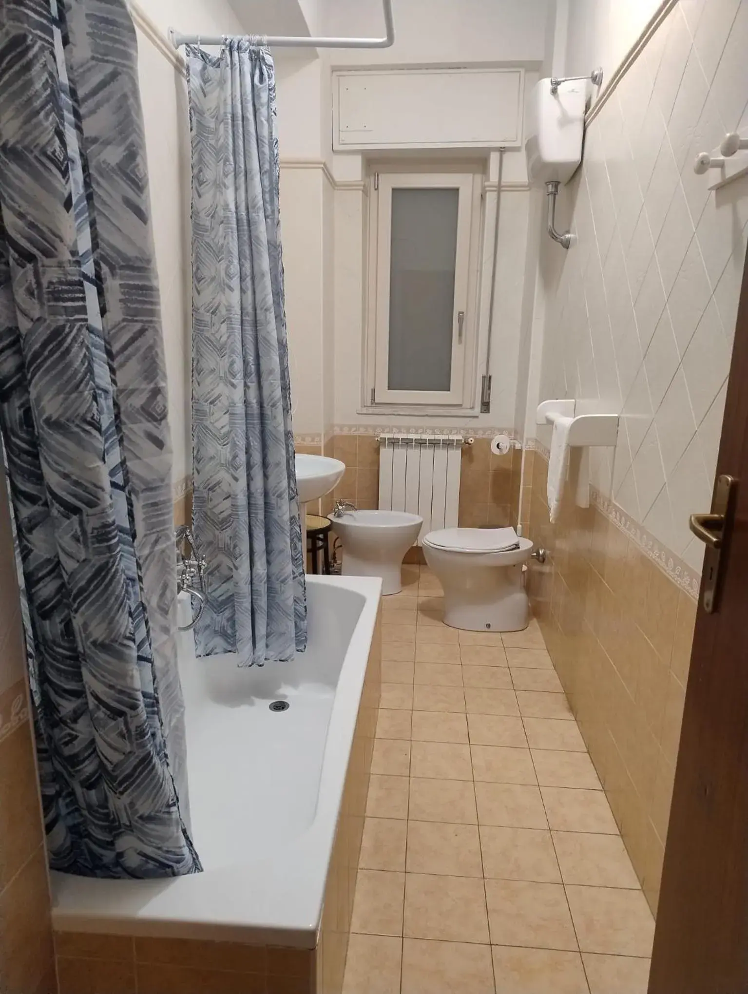 Triple Room with Shared Bathroom - single occupancy in L'attico affittacamere B&B Triple Room with Shared Bathroom - single occupancy in L'attico affittacamere B&B