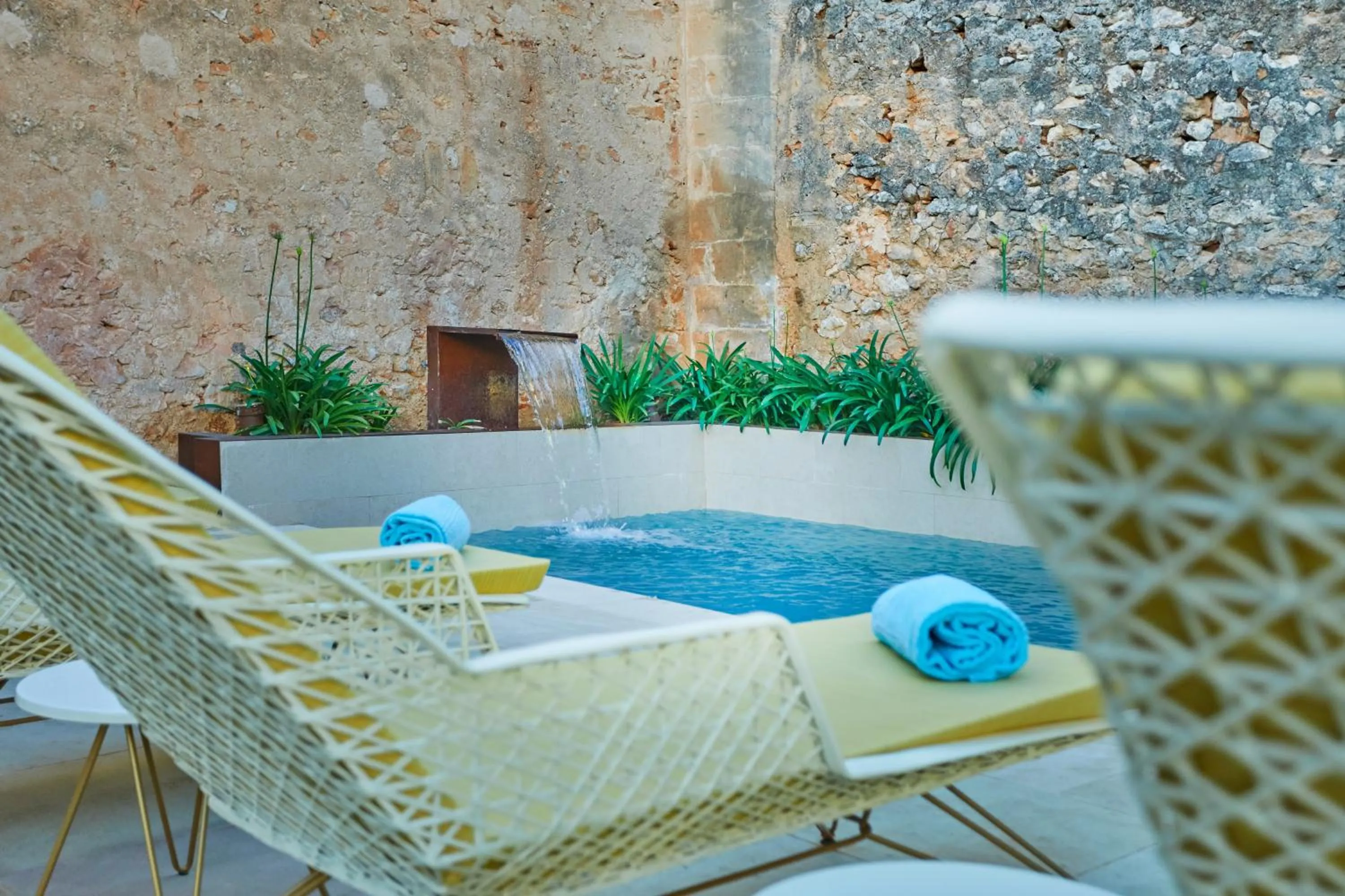 Swimming pool in Sa Creu Nova Petit Palais Art & Spa