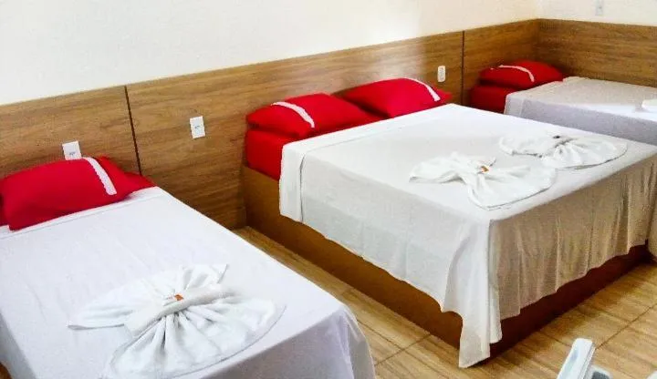 Bed in Pousada Irmãos da Serra