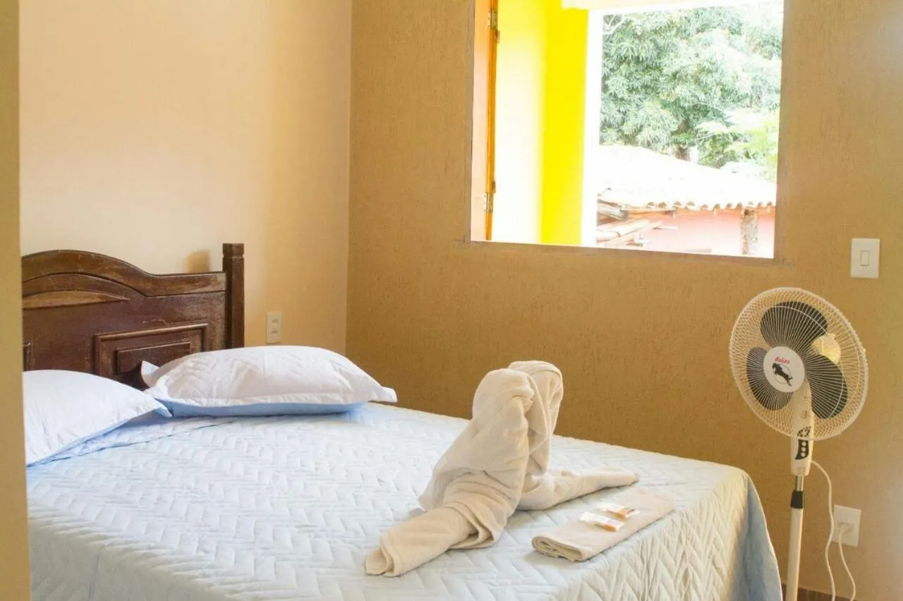 Bed in Pousada Irmãos da Serra