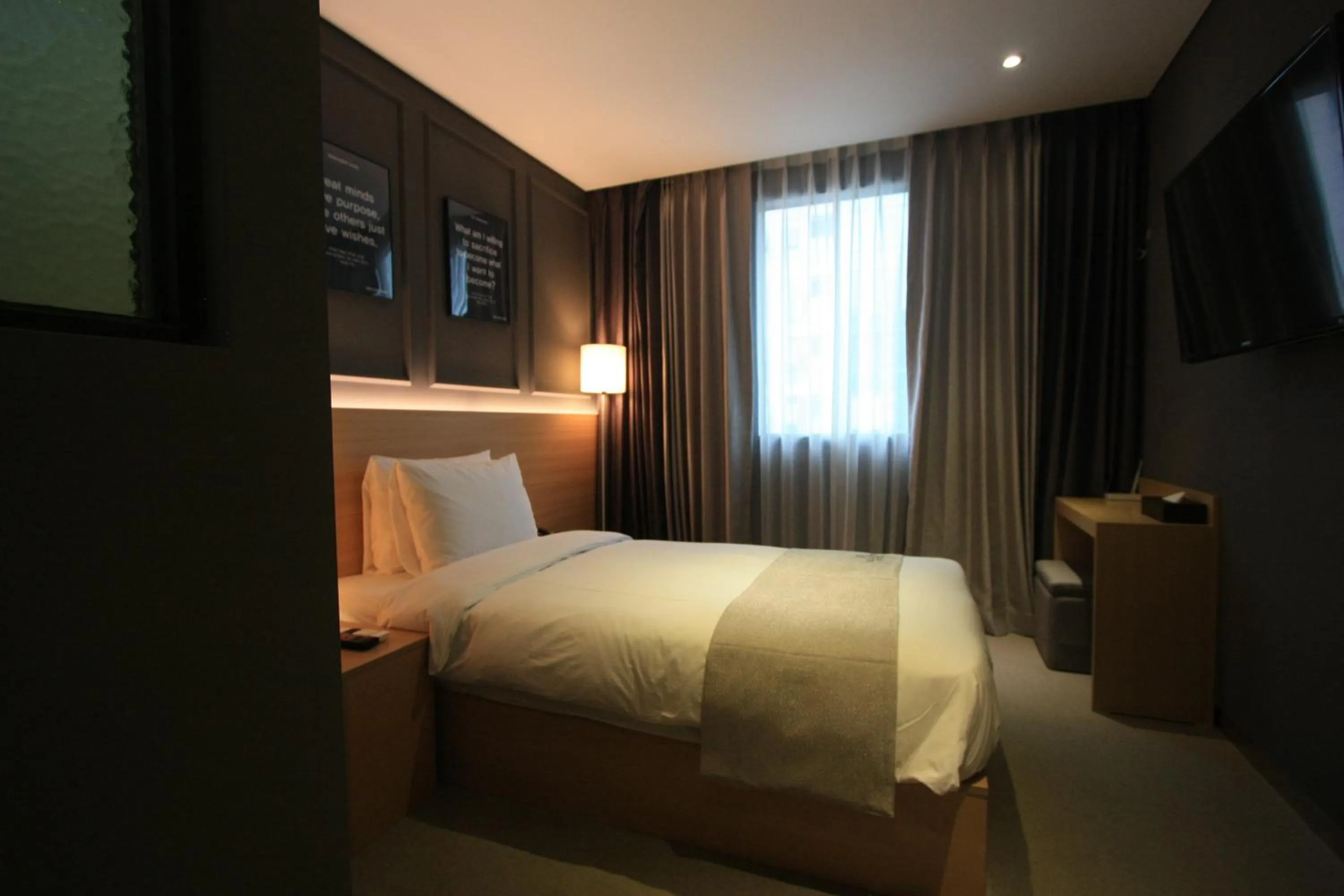 Bed in Vella Suite Hotel