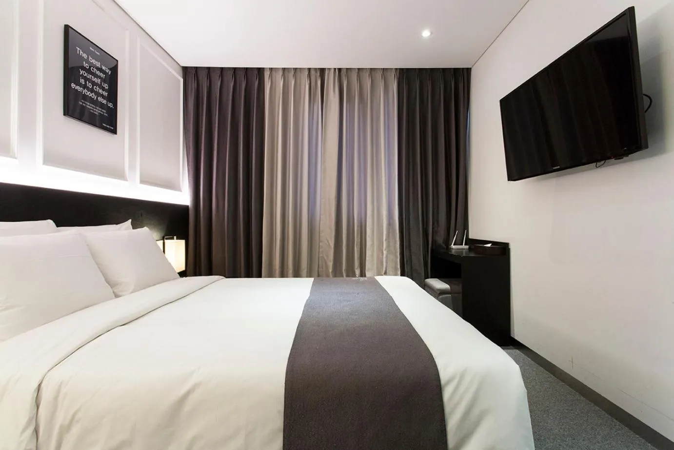 Bed in Vella Suite Hotel