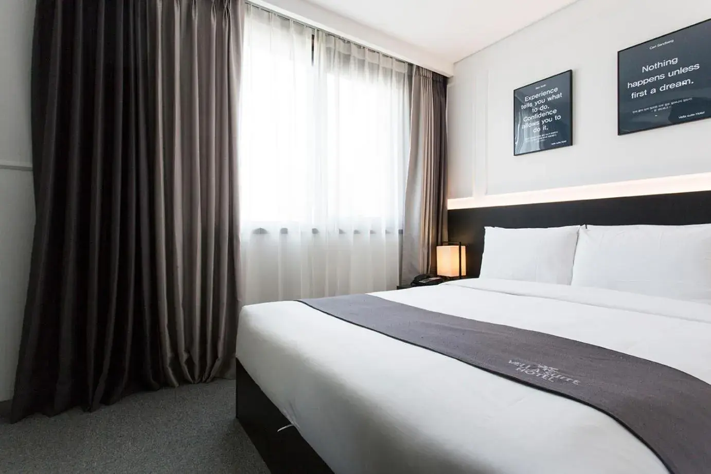 Bed in Vella Suite Hotel Bed in Vella Suite Hotel