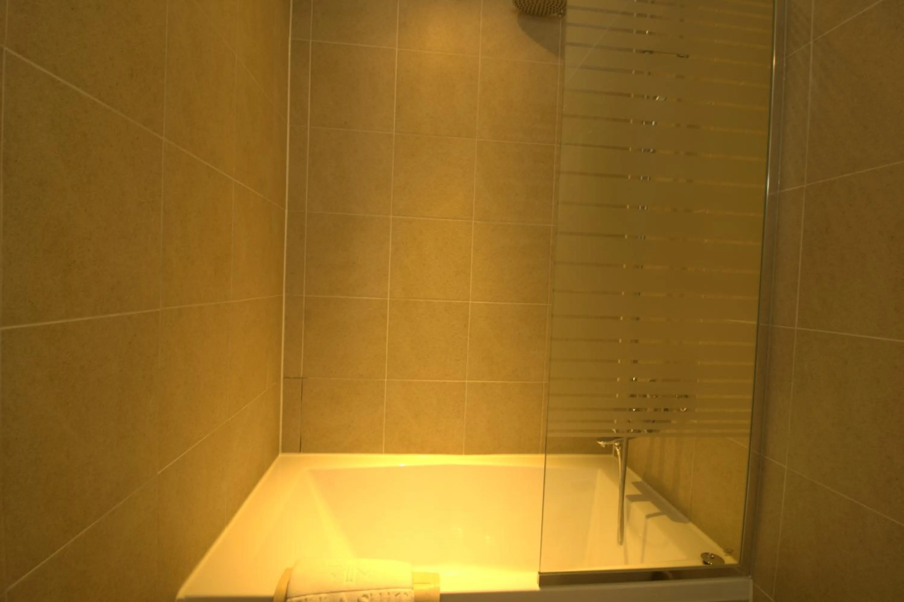 Bathroom in Vella Suite Hotel