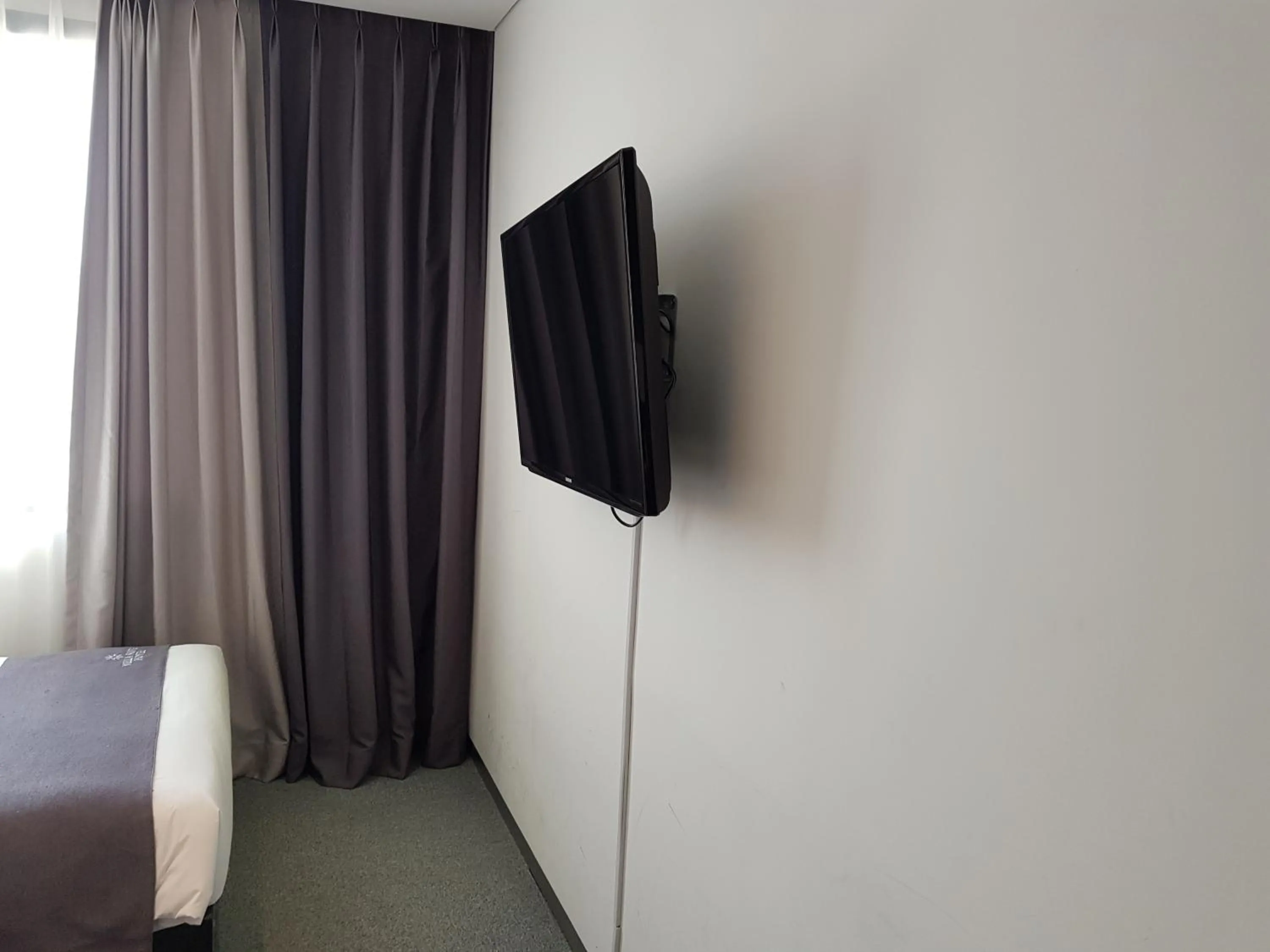 Bed in Vella Suite Hotel