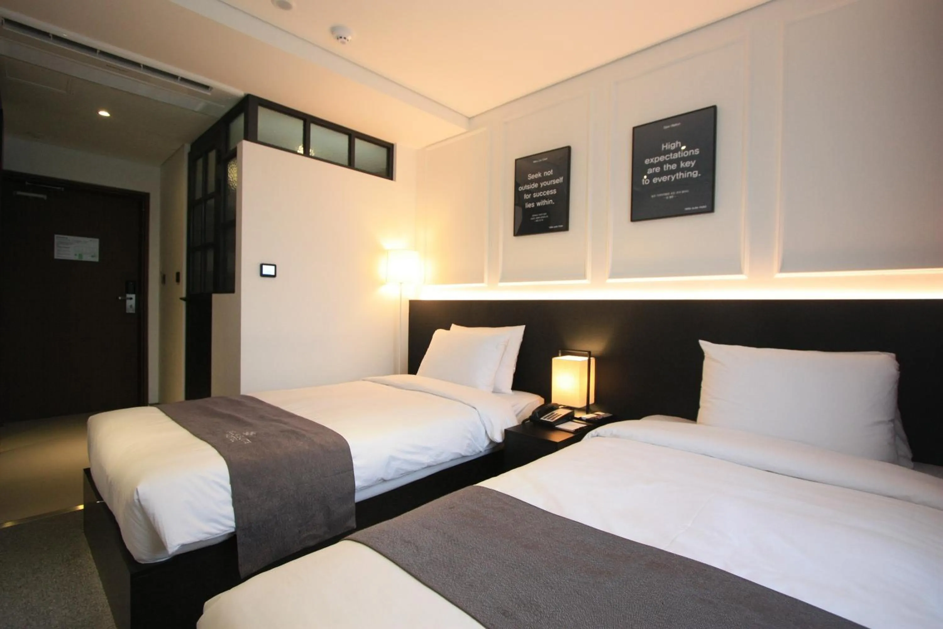 Bed in Vella Suite Hotel