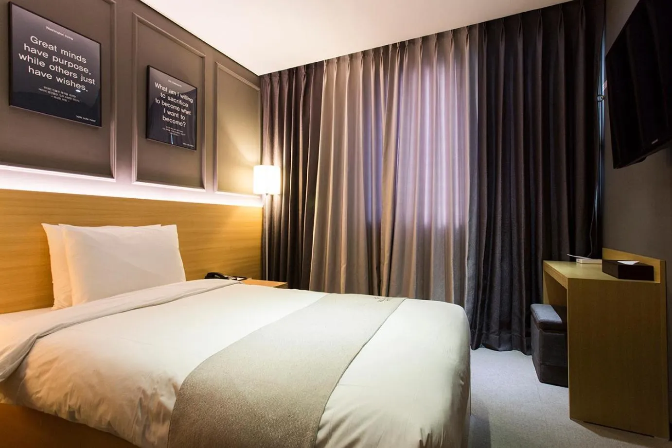 Bed in Vella Suite Hotel