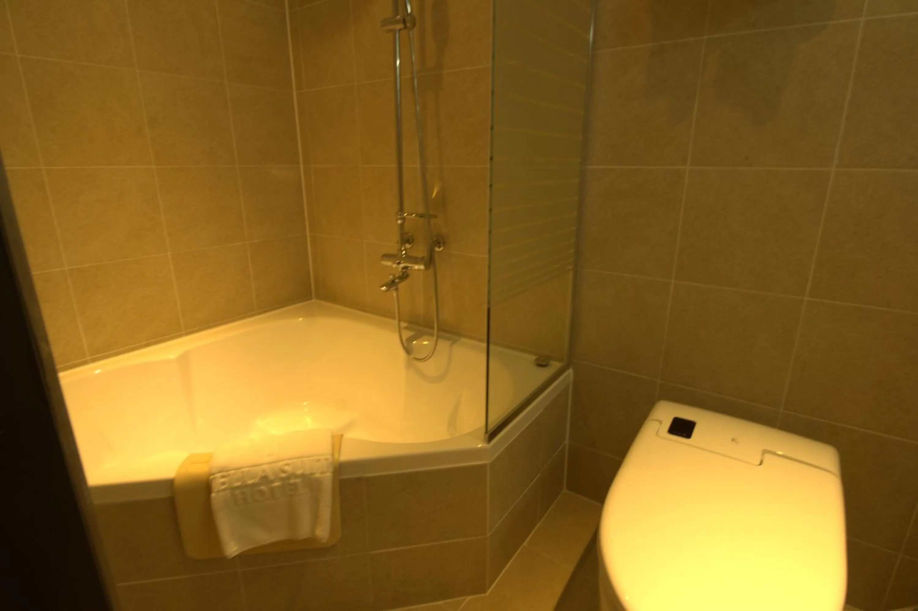 Bathroom in Vella Suite Hotel