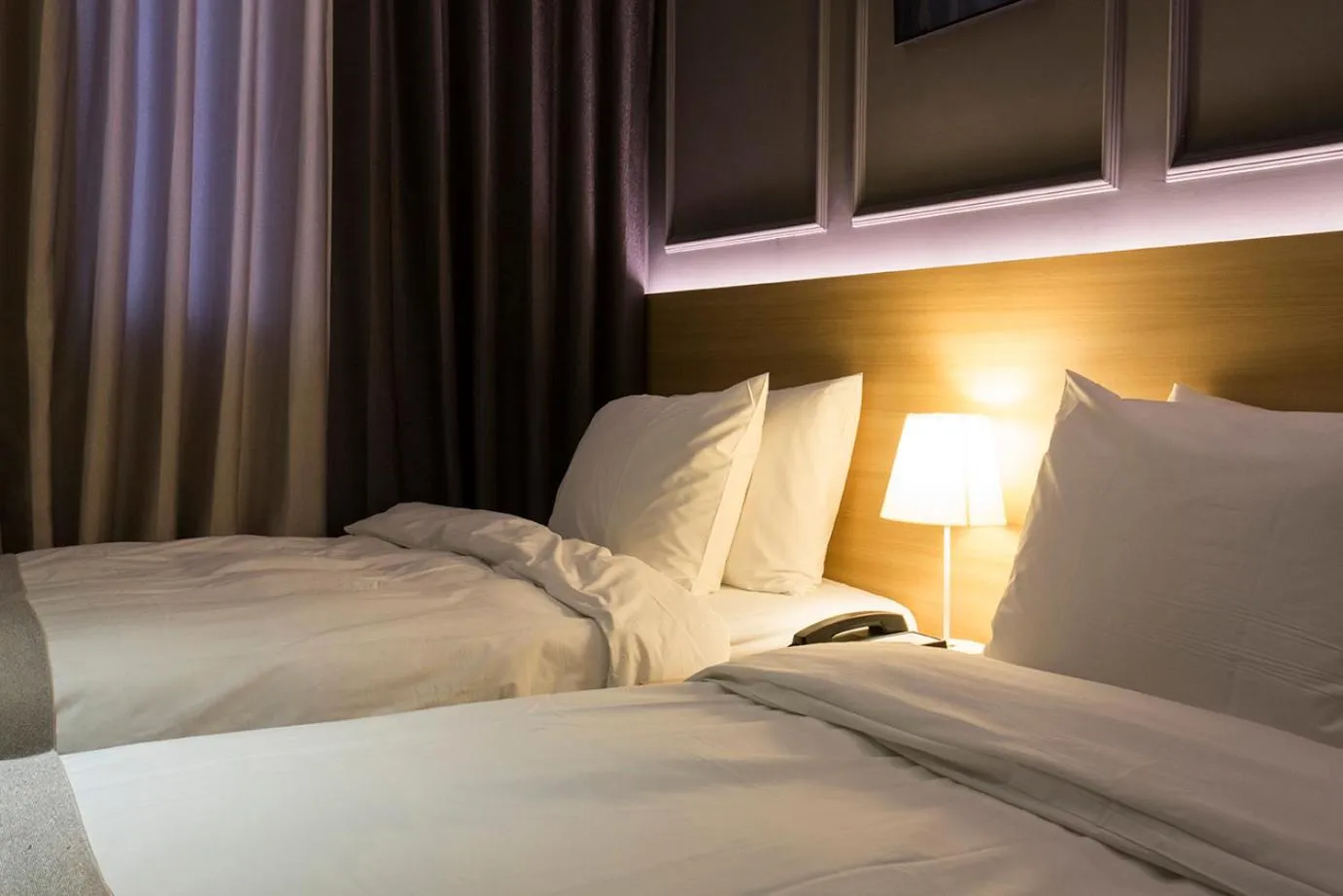 Bed in Vella Suite Hotel