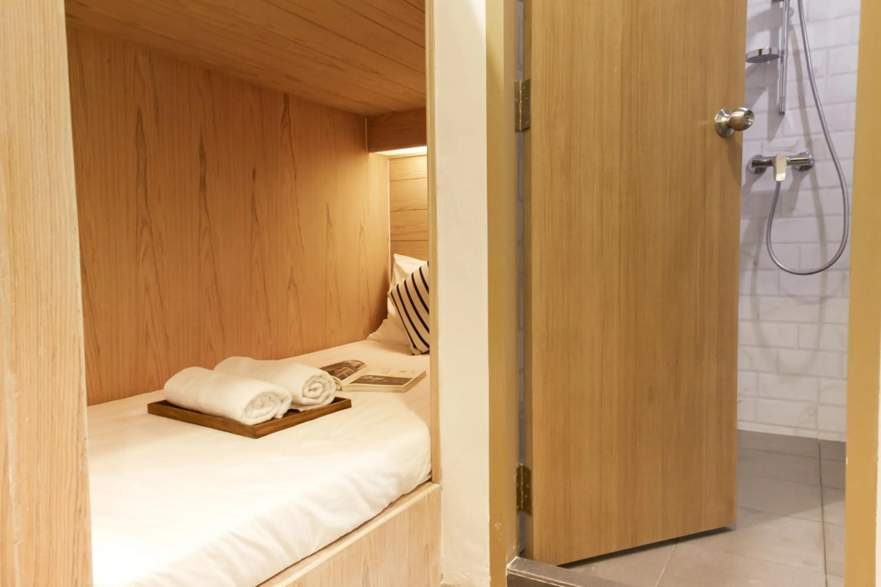 Bed in Vann Bangkok Boutique House